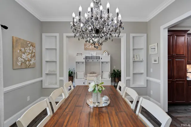 a bedroom with a large bed and a flat screen tv