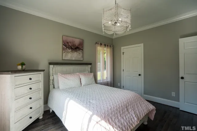 an outdoor space with swimming pool and furniture