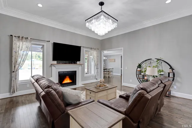 a kitchen with stainless steel appliances granite countertop counter space and wooden floors