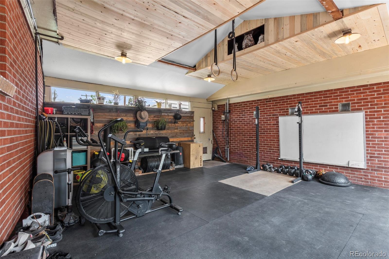 7296 Raritan Street Denver, CO 80221 - Photo 14 of 23 a view of a room with gym equipment