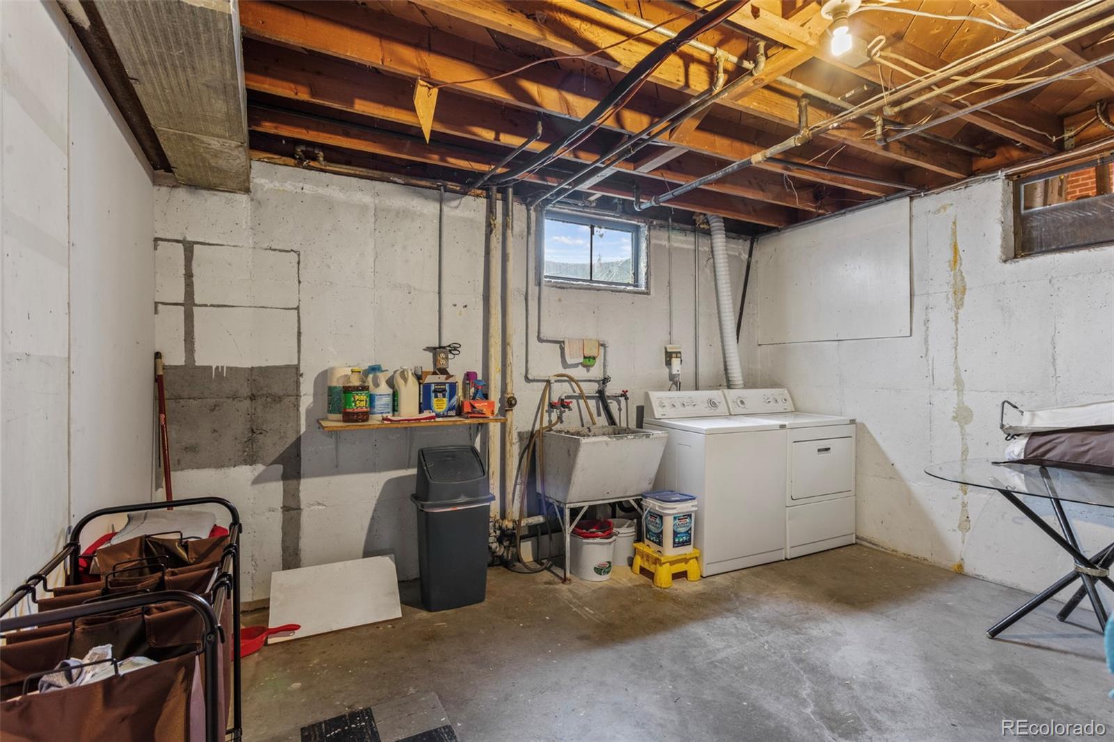 7296 Raritan Street Denver, CO 80221 - Photo 17 of 23 a view of a storage & utility room with stuff