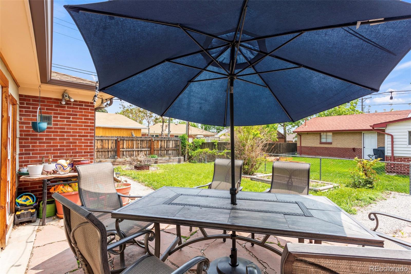 7296 Raritan Street Denver, CO 80221 - Photo 21 of 23 a view of an outdoor space with seating