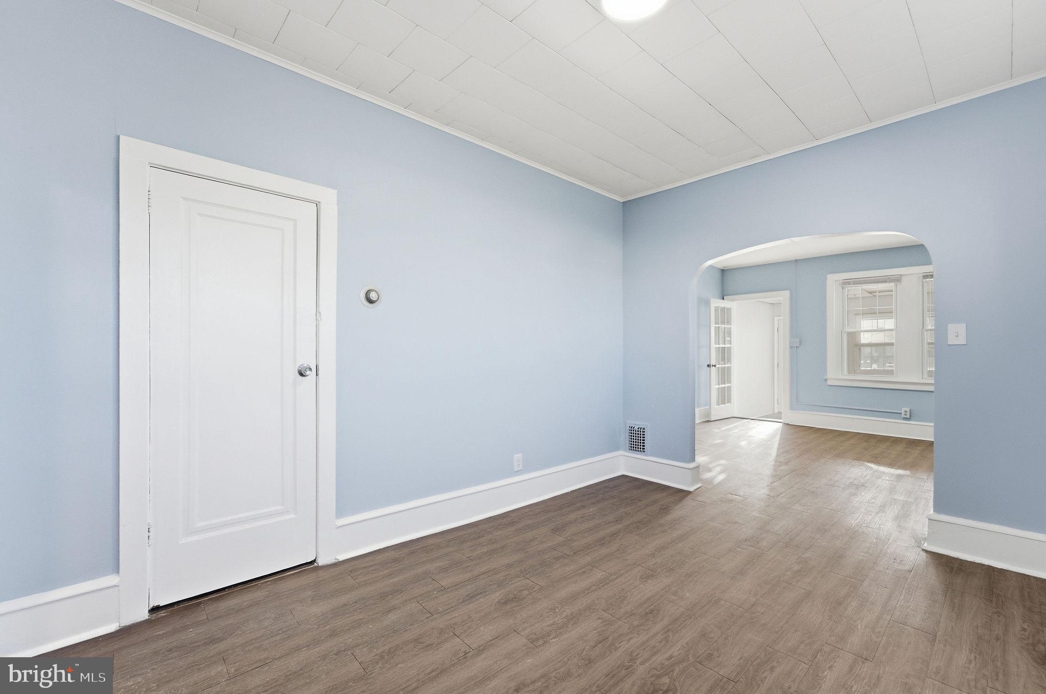 601 Hunter Street Gloucester City, NJ 08030 - Photo 11 of 35 an empty room with wooden floor and closet