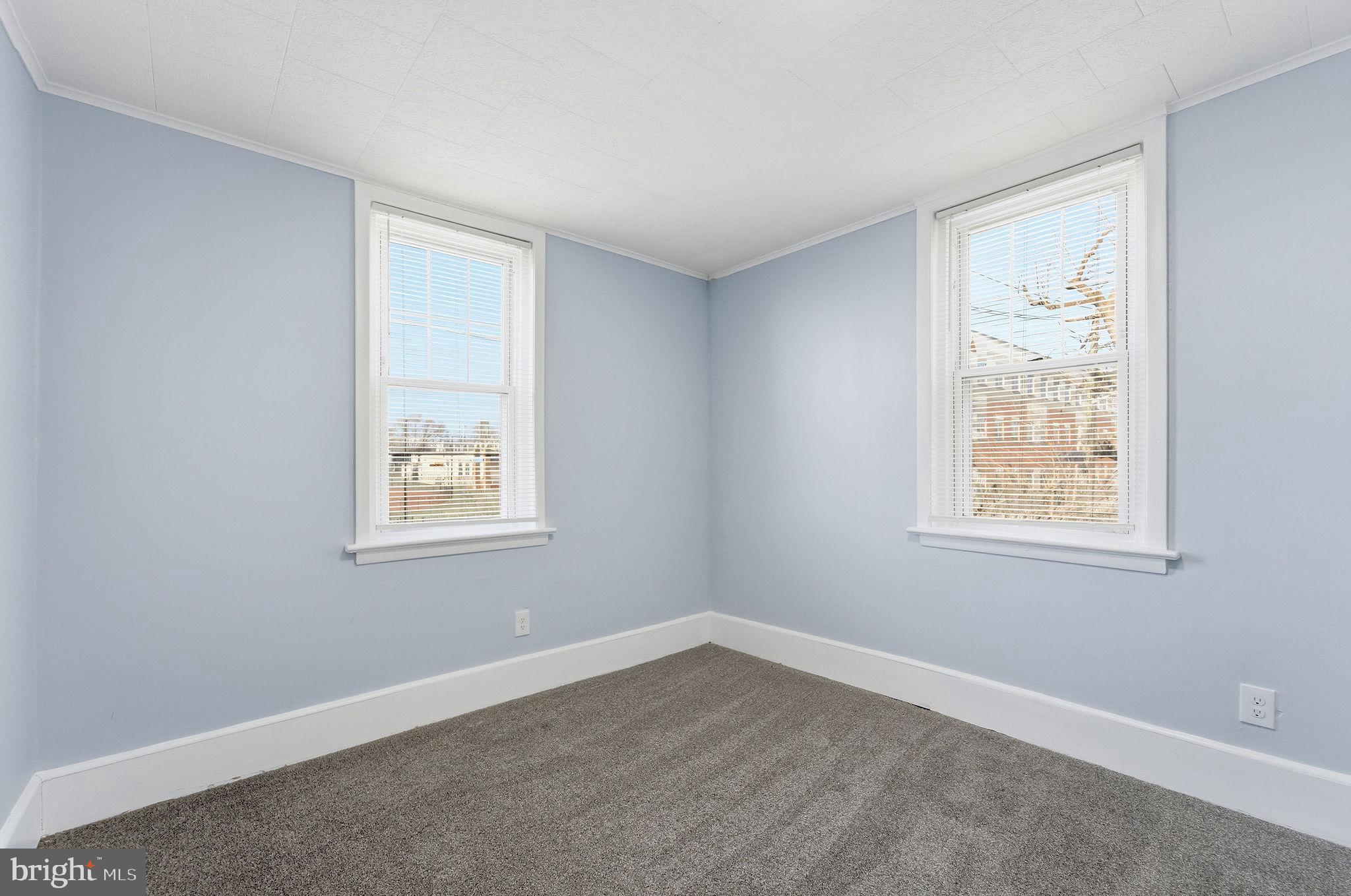 601 Hunter Street Gloucester City, NJ 08030 - Photo 18 of 35 an empty room with windows