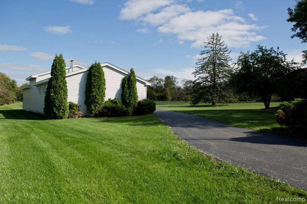 4890 East Dunbar Road Monroe, MI 48161 - Photo 15 of 18 Dunbar 4890 E Drive to Detached Garage.jpg
