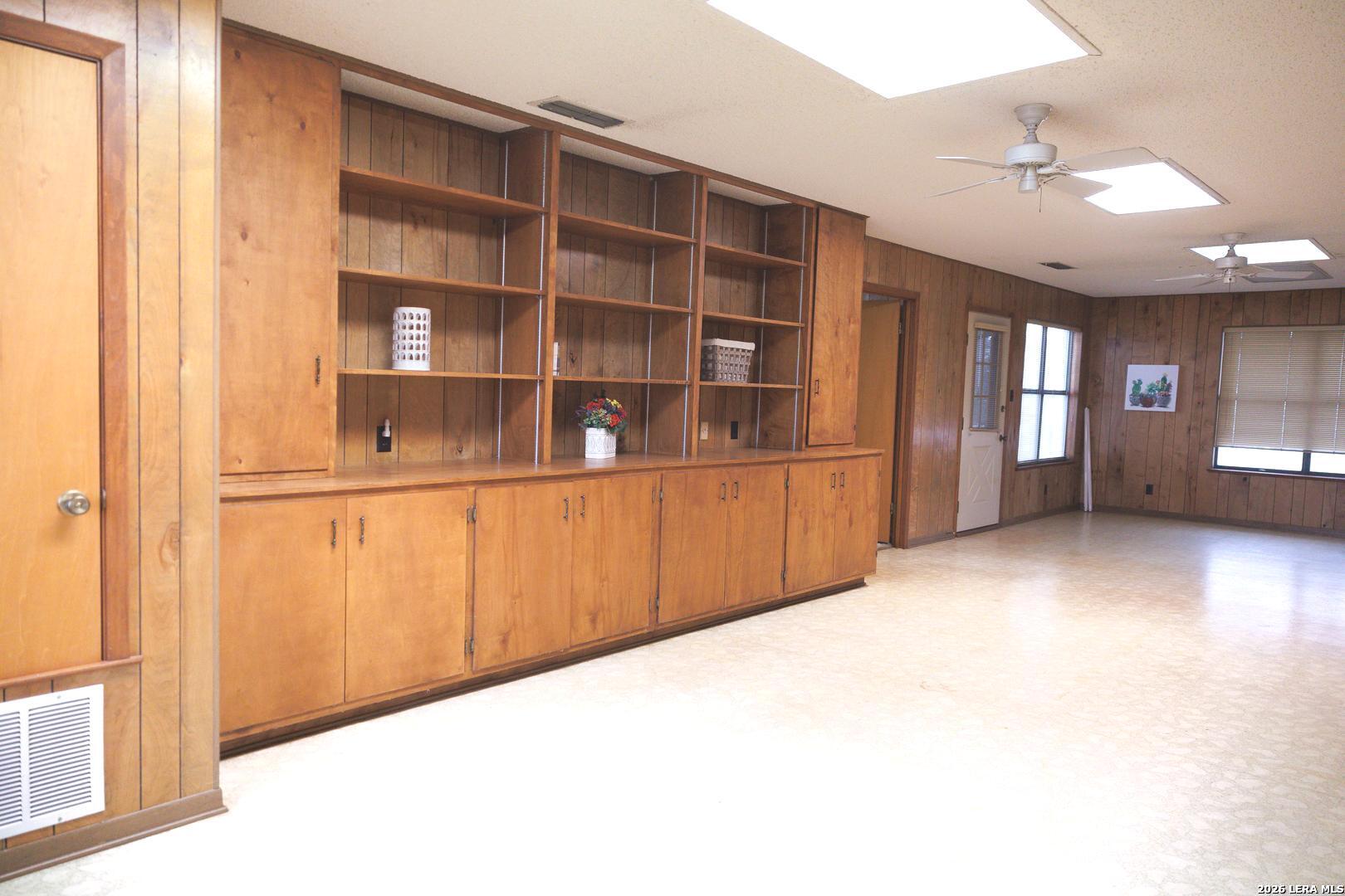 105 South Sayers Drive Devine, TX 78016 - Photo 12 of 23 a view of an empty room with a window