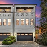 a front view of a building with garden