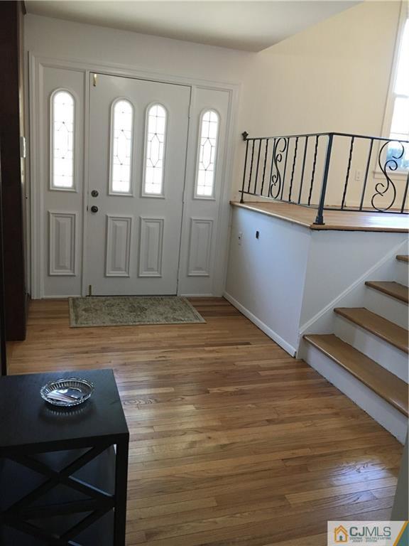 22 Perry Road East Brunswick, NJ 08816 - Photo 2 of 10 a view of a livingroom with wooden floor