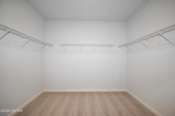 a view of a room with racks on the wall