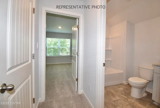 a bathroom with a toilet