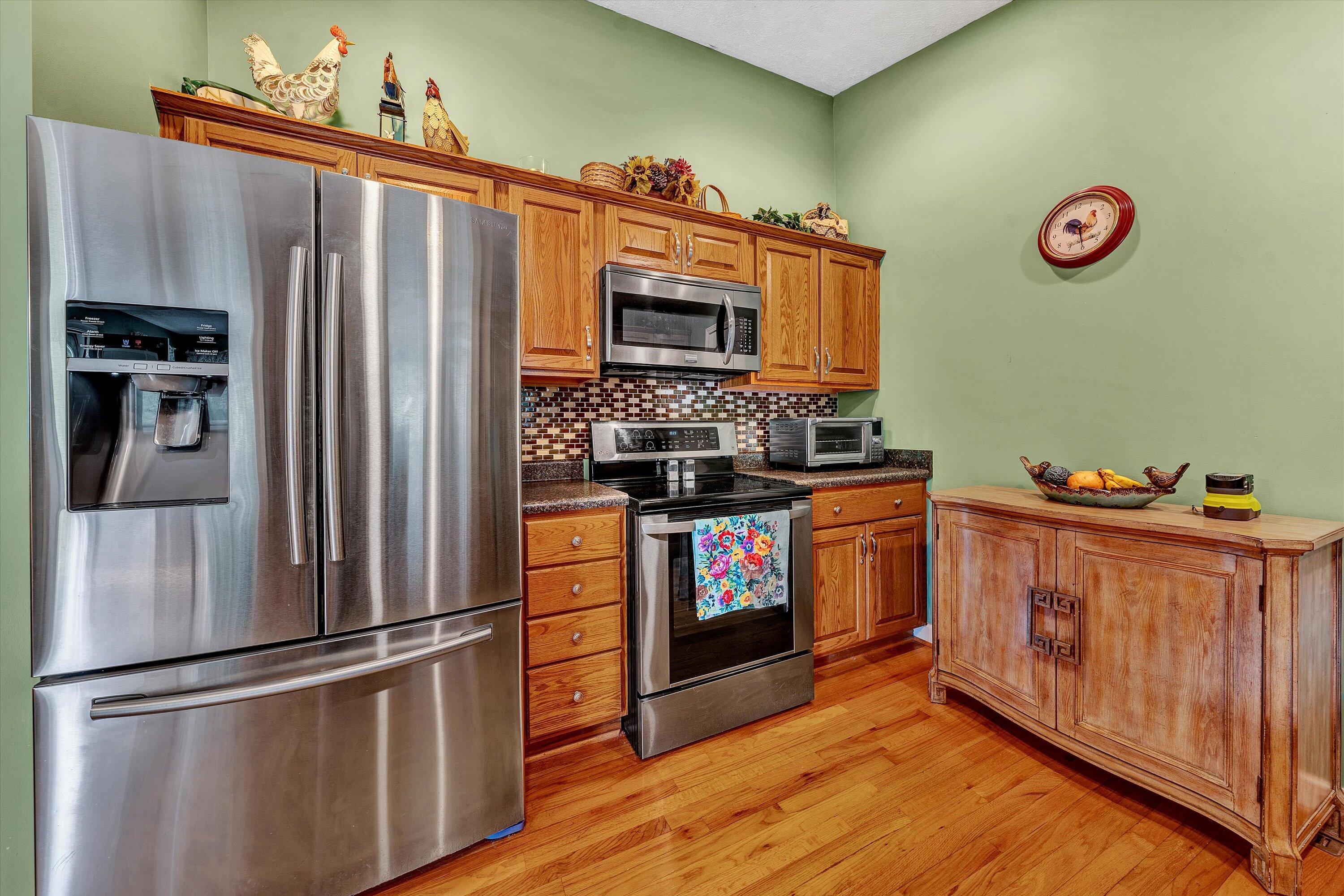 2530 Edwardsville Road Hardy, VA 24101 - Photo 11 of 30 a kitchen with stainless steel appliances a refrigerator and a stove
