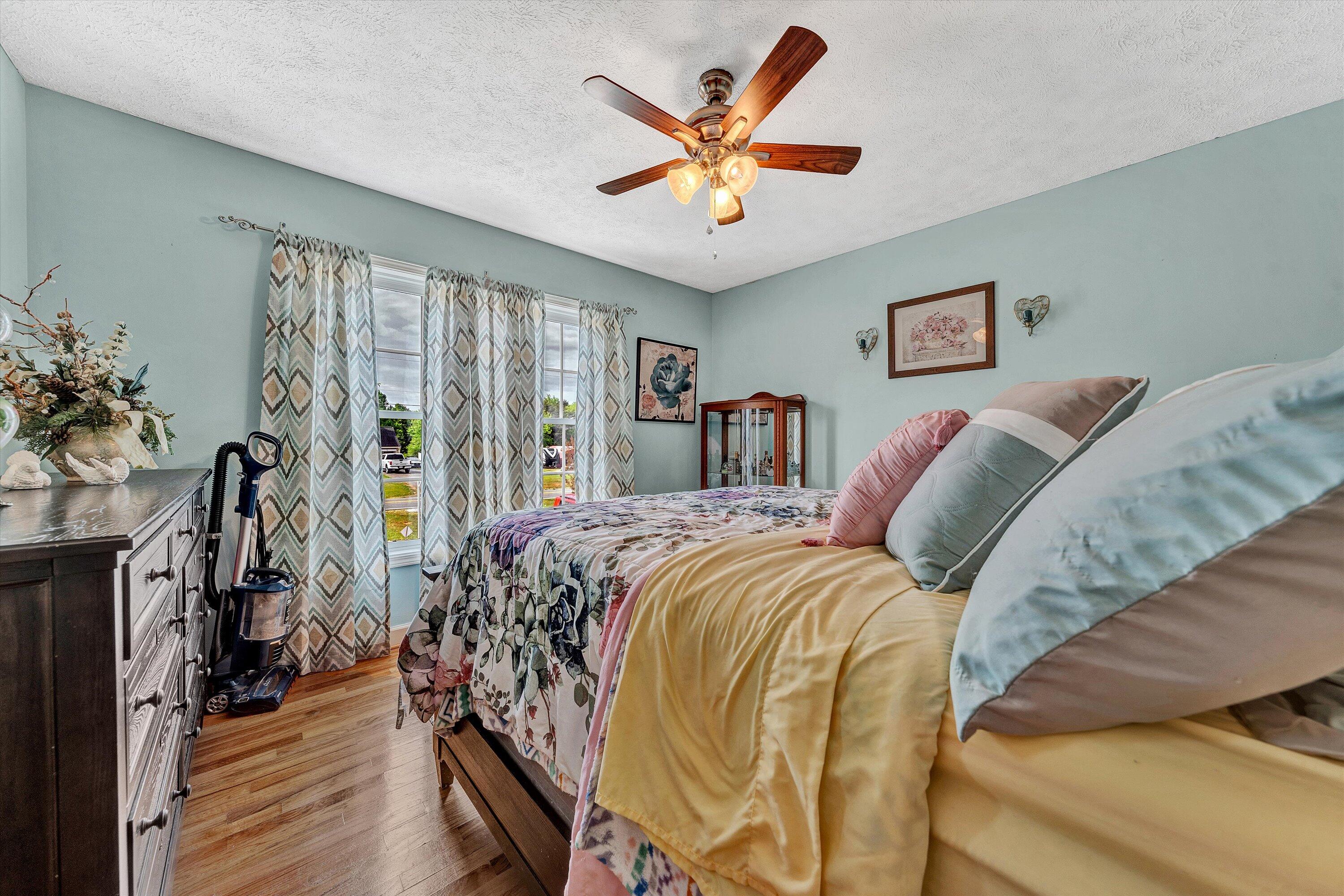 2530 Edwardsville Road Hardy, VA 24101 - Photo 15 of 30 a bed sitting in a bedroom next to a window