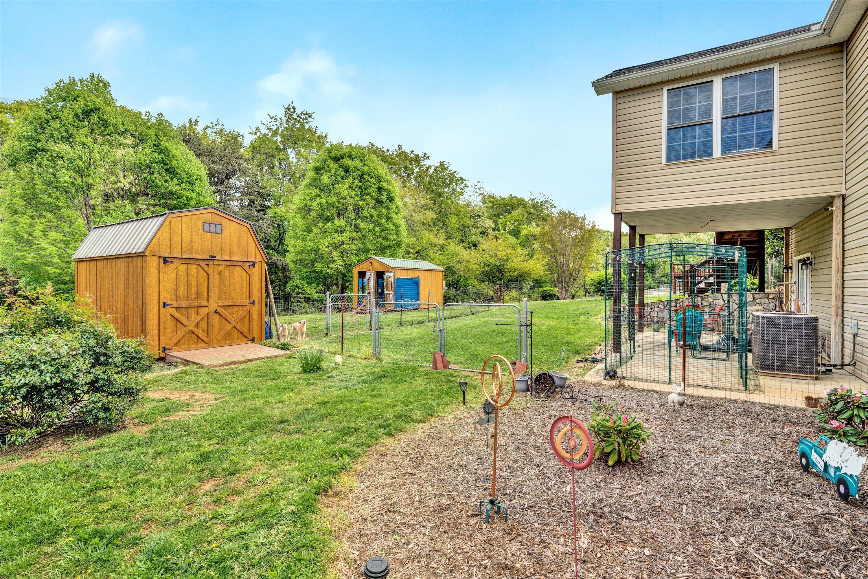 2530 Edwardsville Road Hardy, VA 24101 - Photo 25 of 30 a view of backyard with outdoor seating and green space