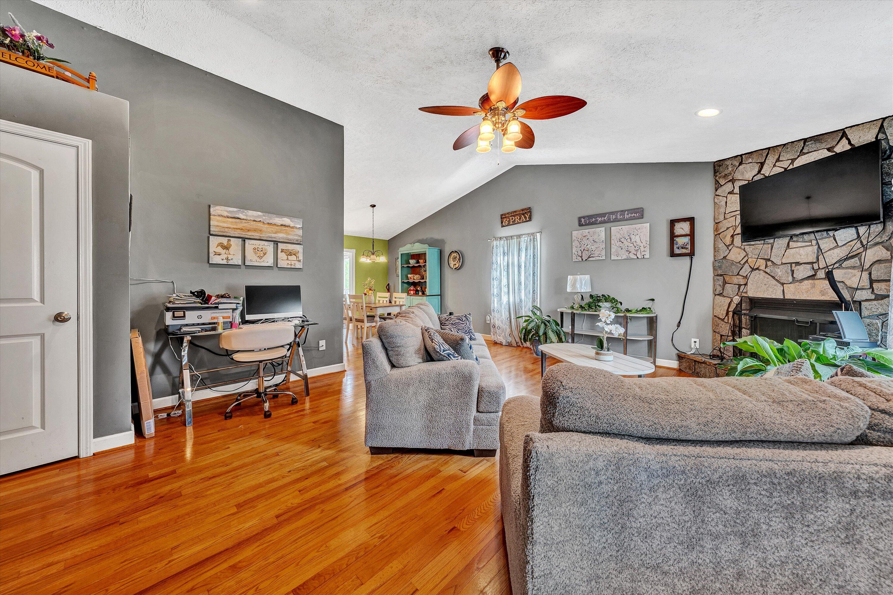 2530 Edwardsville Road Hardy, VA 24101 - Photo 4 of 30 a living room with furniture and a flat screen tv