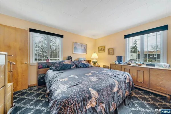 a view of a garden with houses