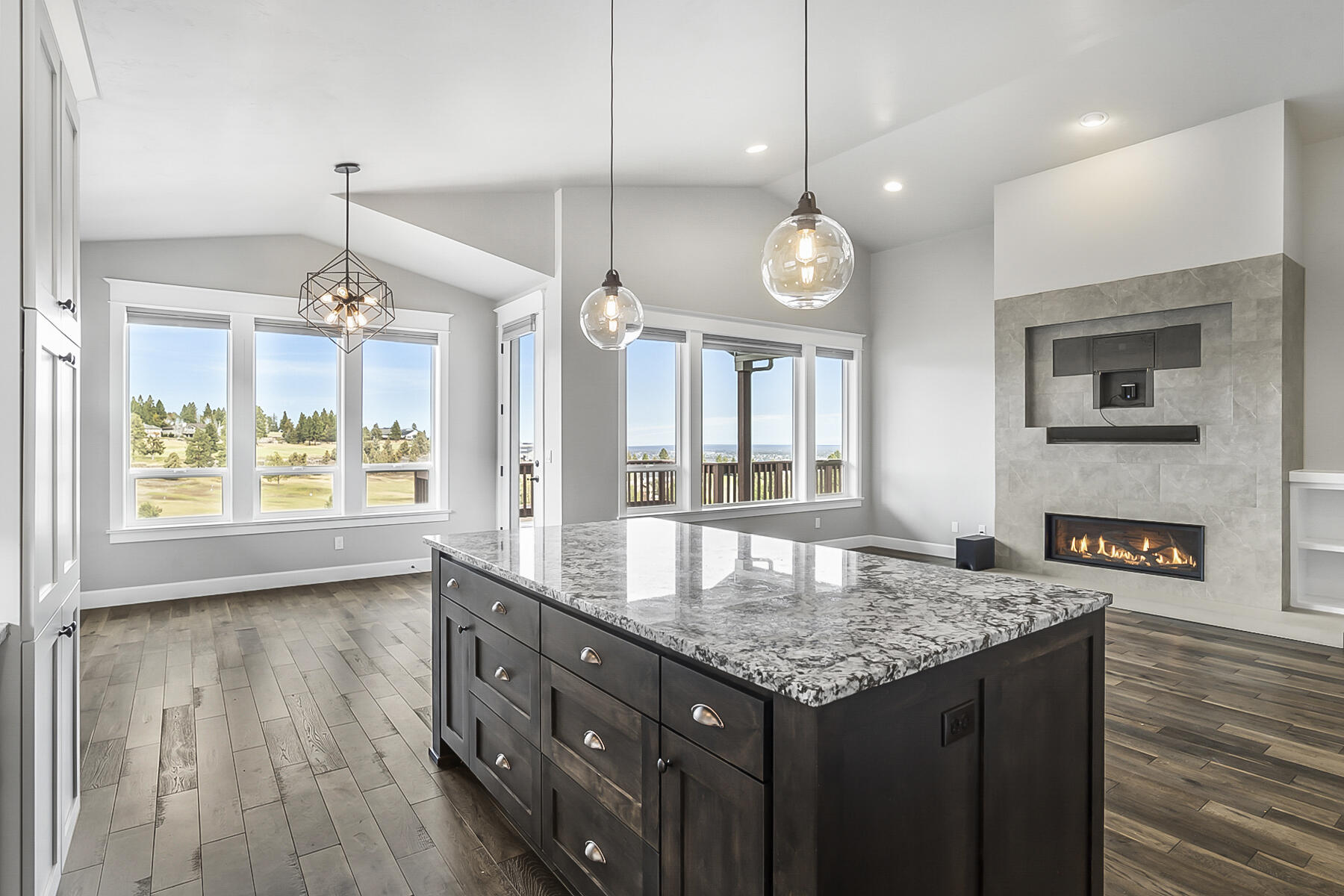 2612 Northwest Compass Corner Loop Bend, OR 97703 - Photo 13 of 44 Lots of light and bright into the Dining area and Great Room with Deck access