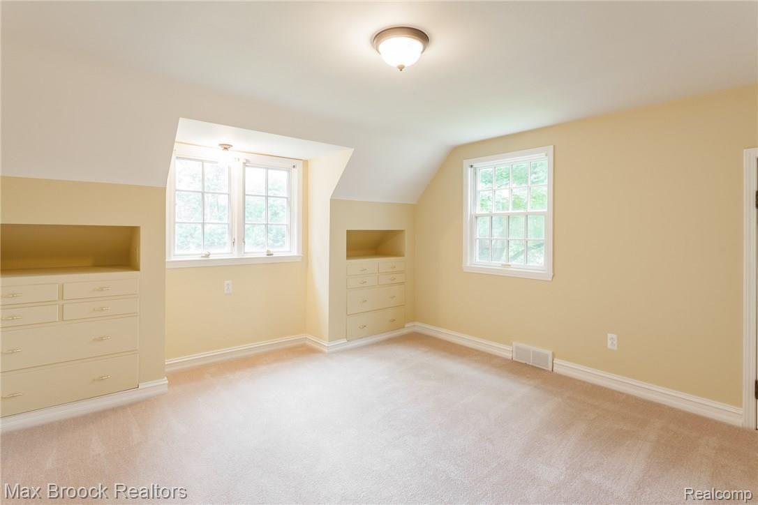 4905 Charing Cross Road Bloomfield Hills, MI 48304 - Photo 49 of 59 A room full of sunshine! Gorgeous built in dressers that have been preserved immaculately.