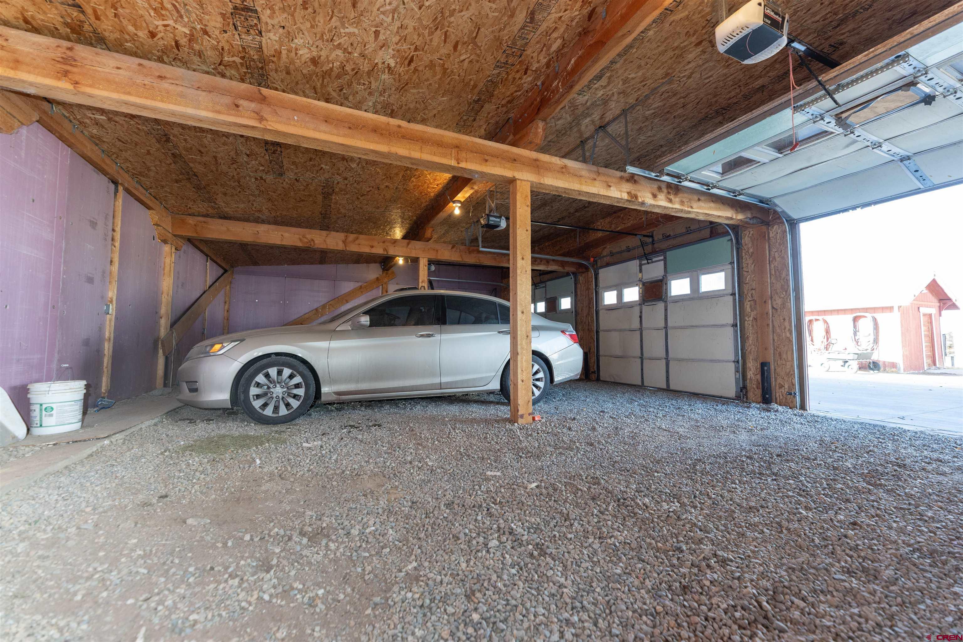 2716 Threemile Road Alamosa, CO 81101 - Photo 26 of 45 a view of a car garage