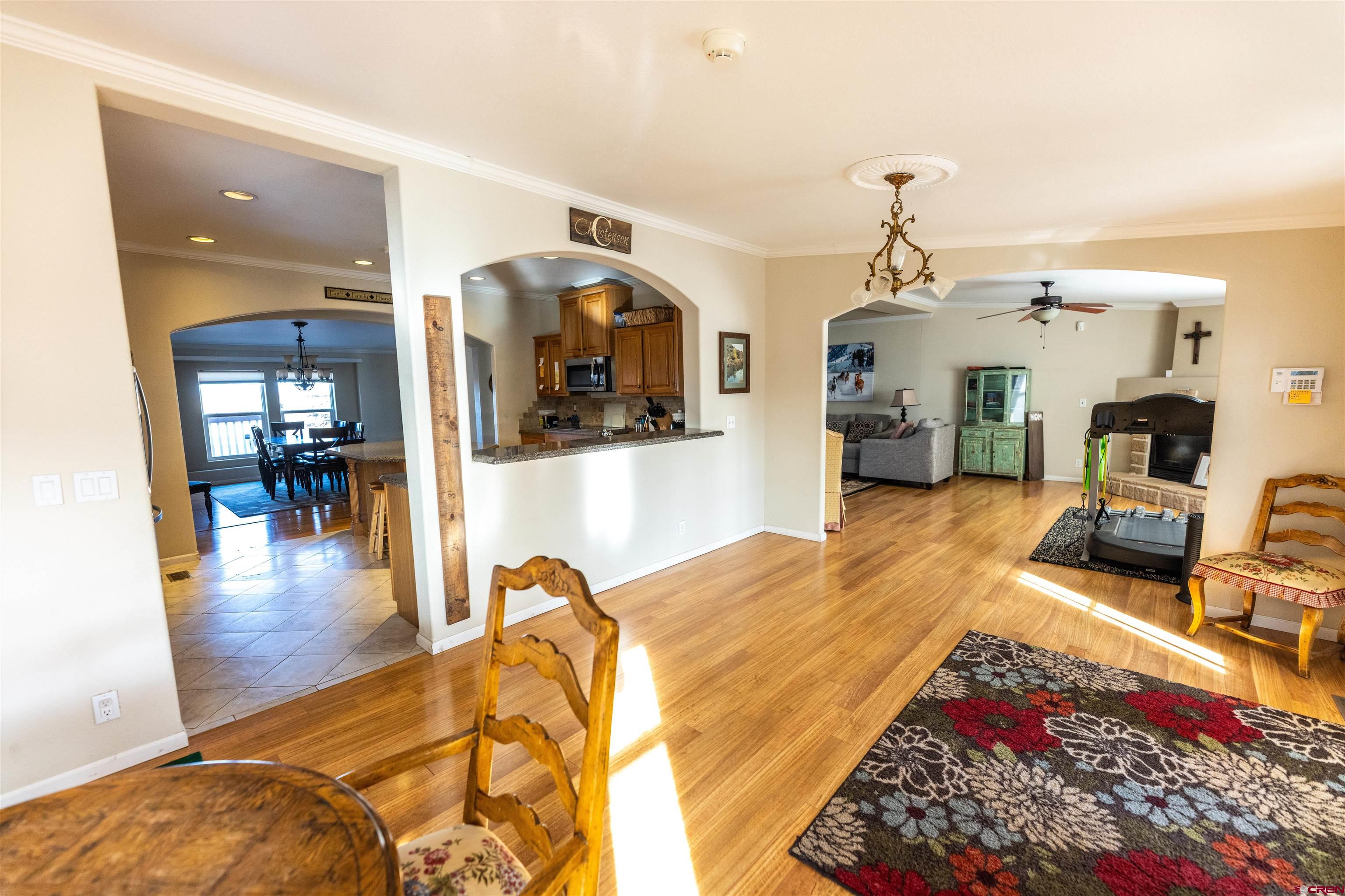 2716 Threemile Road Alamosa, CO 81101 - Photo 10 of 45 a living room with furniture and wooden floor