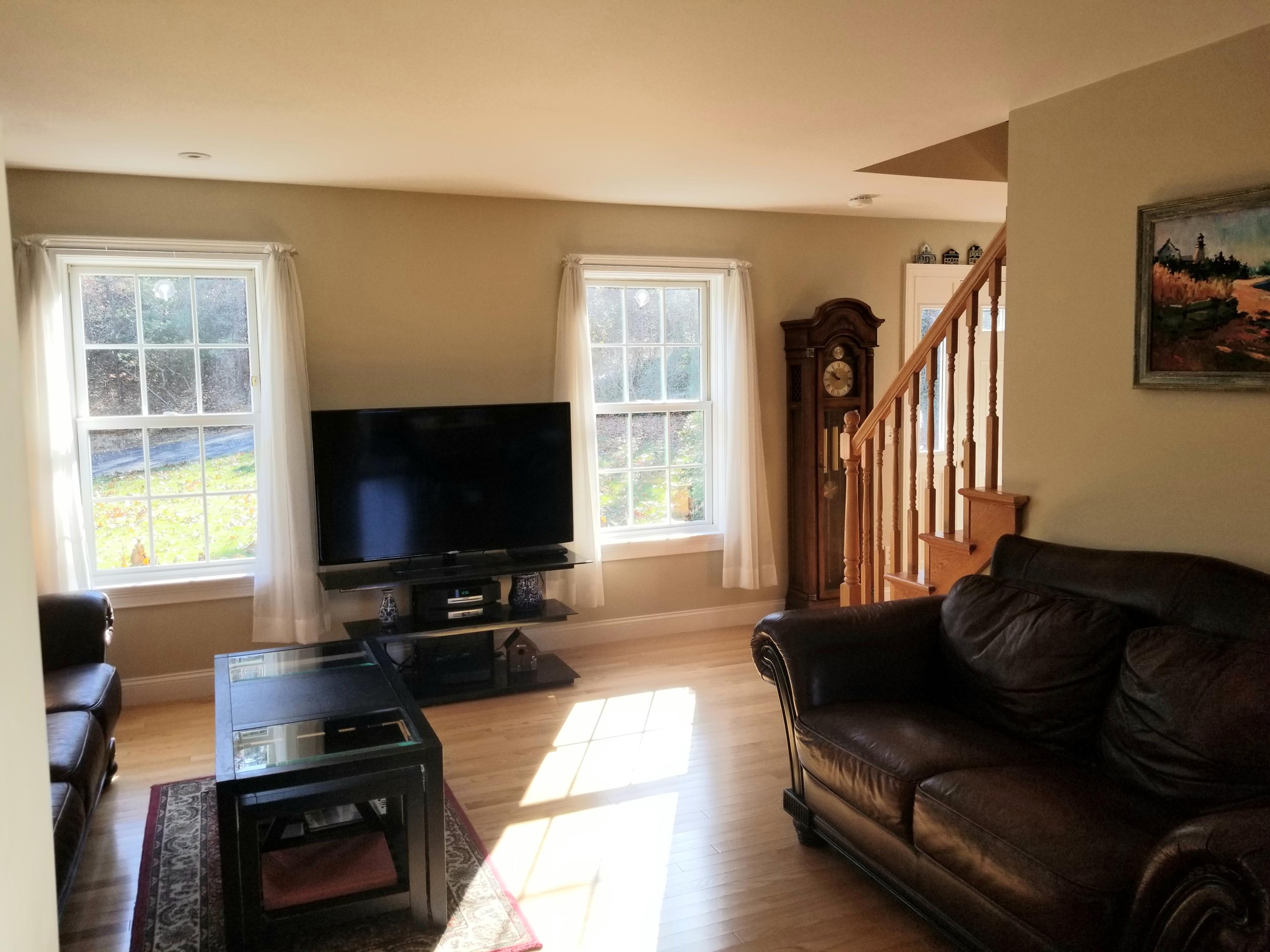 2 Easting Road Bourne, MA 02532 - Photo 12 of 34 a living room with furniture and a flat screen tv