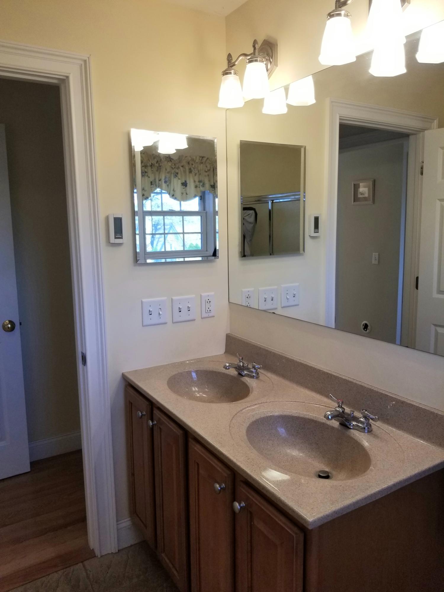 2 Easting Road Bourne, MA 02532 - Photo 23 of 34 a bathroom with a sink and a mirror