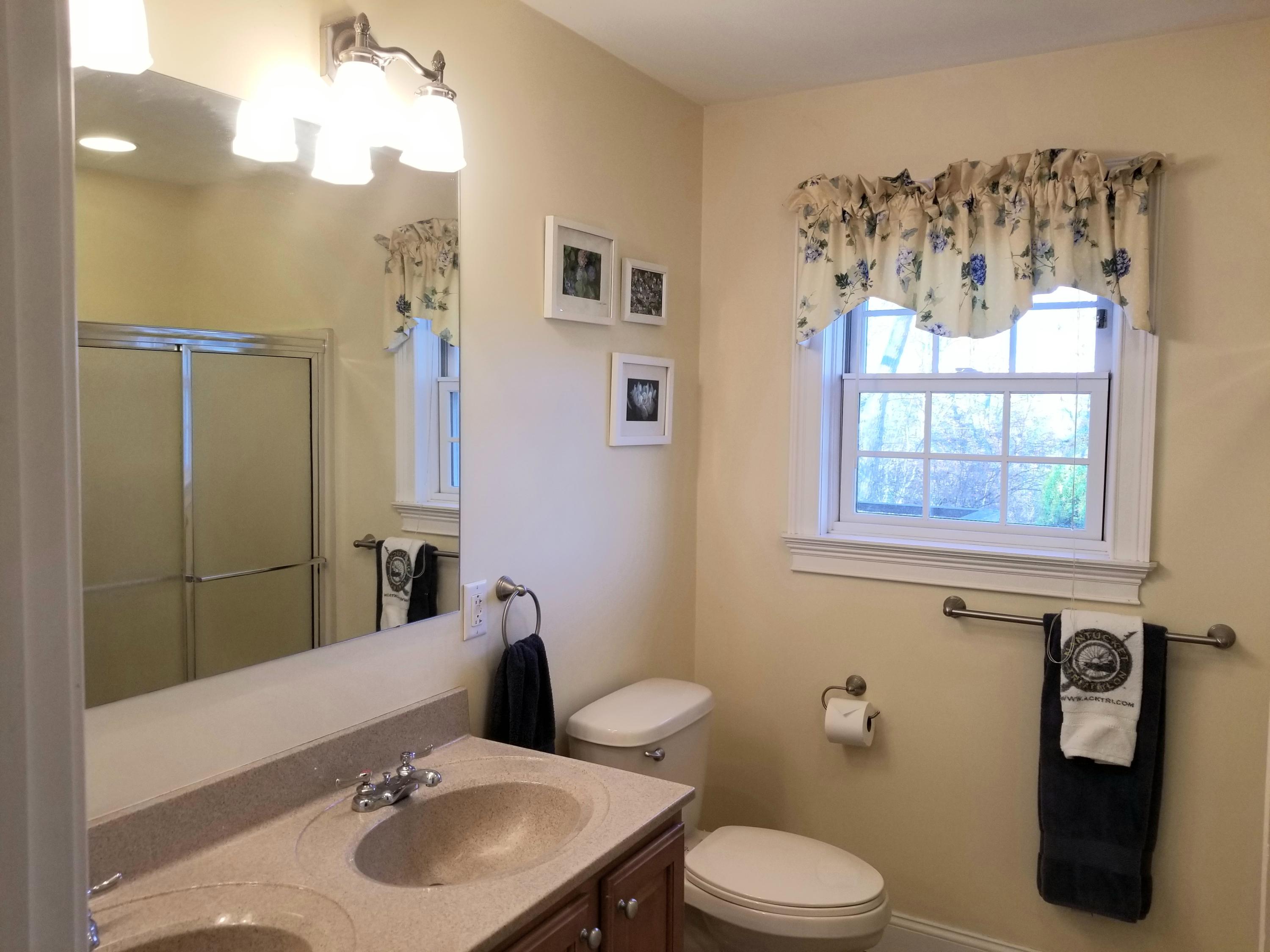 2 Easting Road Bourne, MA 02532 - Photo 24 of 34 a bathroom with a sink toilet and shower