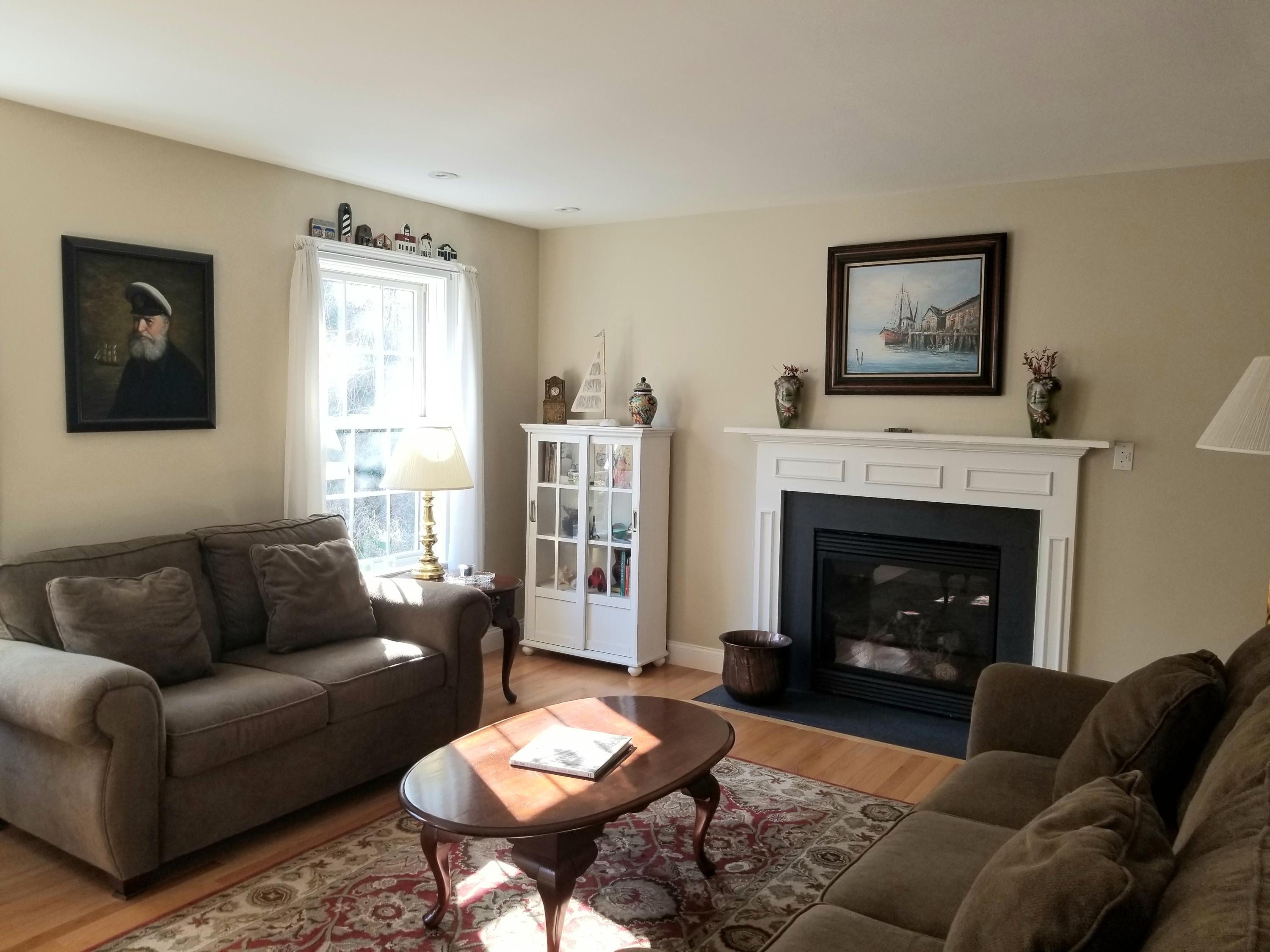 2 Easting Road Bourne, MA 02532 - Photo 5 of 34 a living room with furniture and a fireplace
