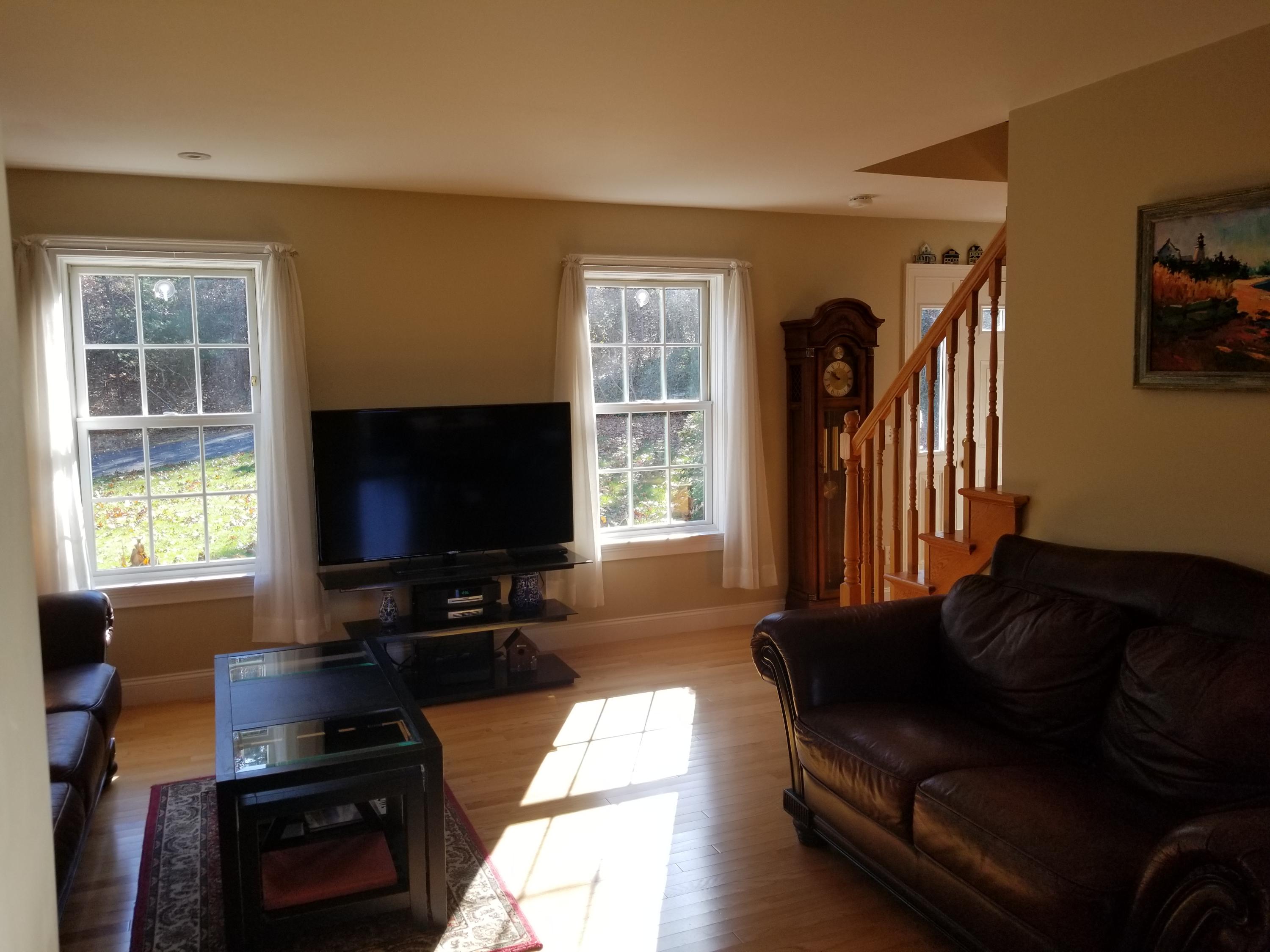 2 Easting Road Bourne, MA 02532 - Photo 7 of 34 a living room with furniture and a flat screen tv