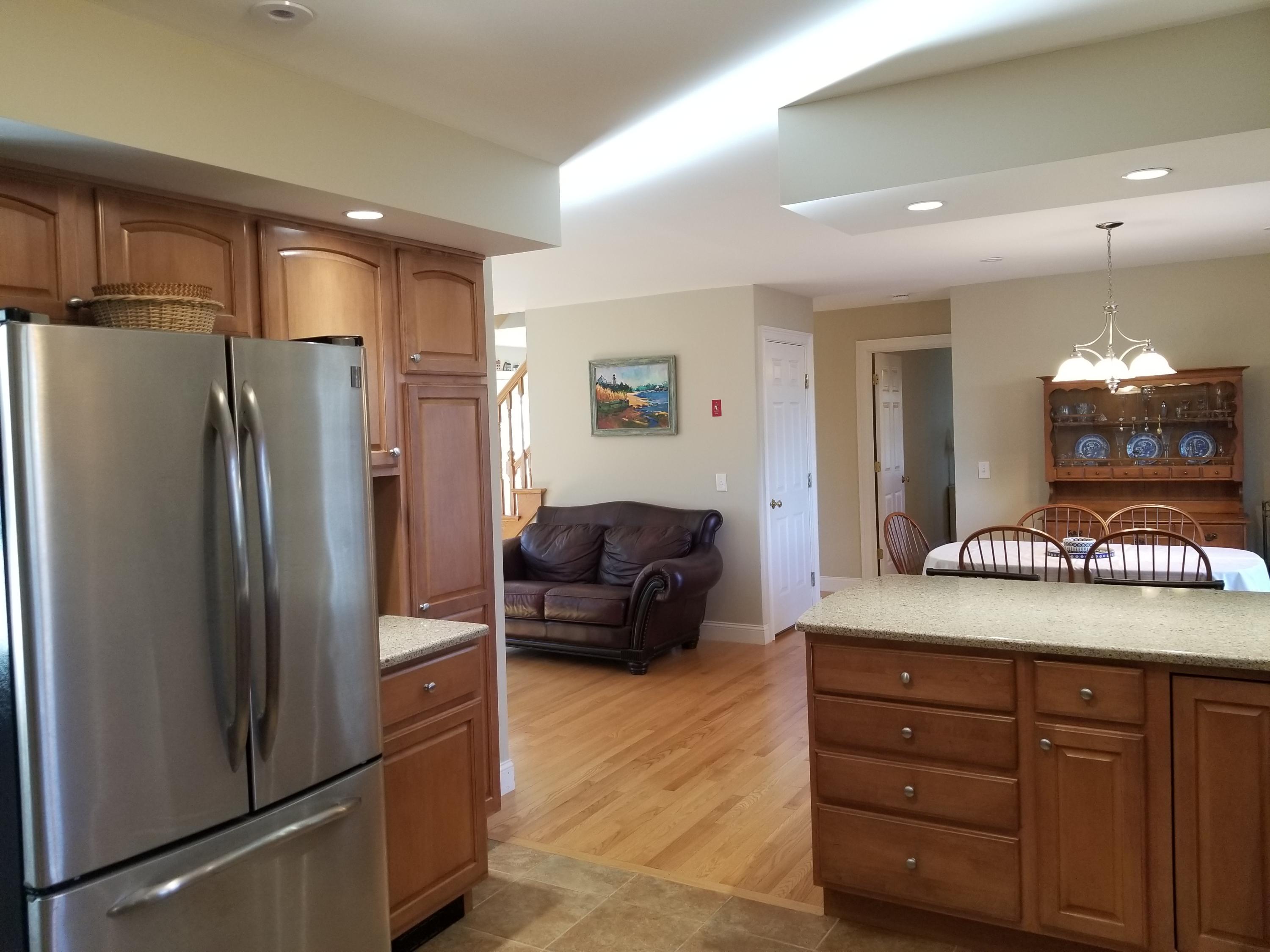 2 Easting Road Bourne, MA 02532 - Photo 8 of 34 a kitchen with granite countertop a refrigerator and a sink