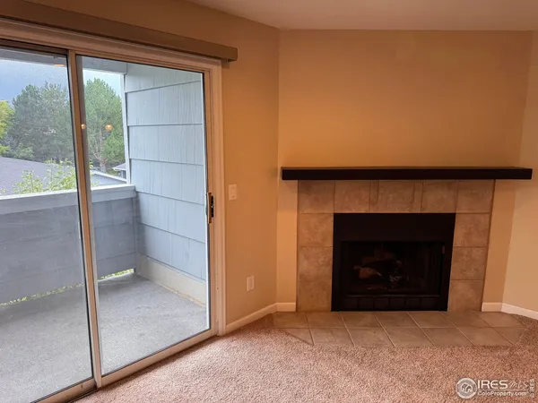 a living room with a fireplace