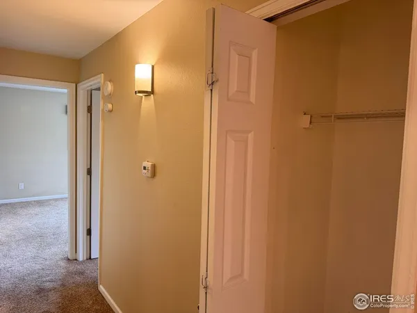 a bathroom with a shower and a glass door
