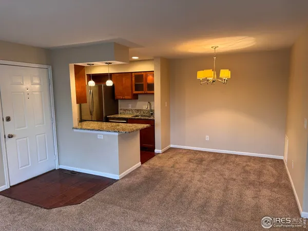 a view of a kitchen with a sink