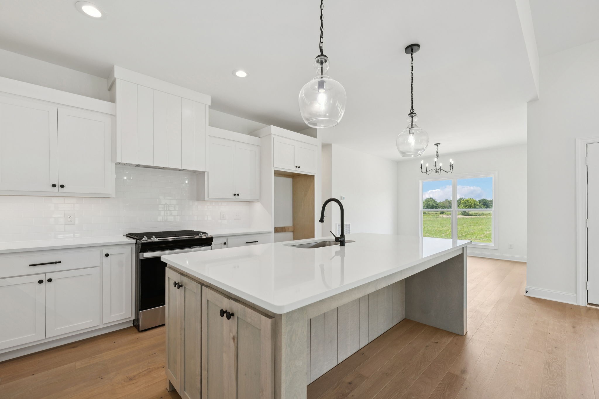 0 Midland Road Bell Buckle, TN 37020 - Photo 12 of 36 a kitchen that has a lot of cabinets in it and stainless steel appliances