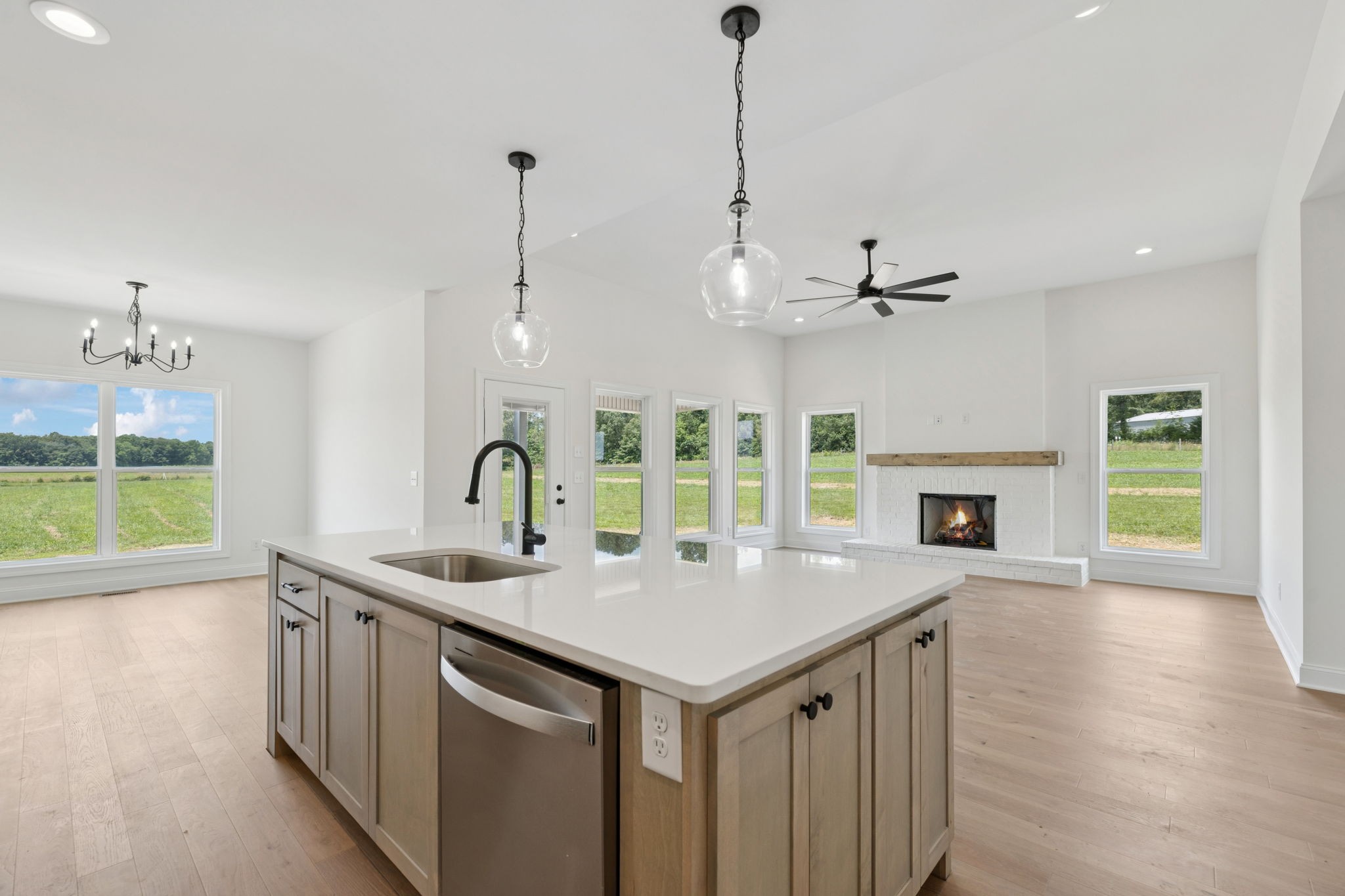 0 Midland Road Bell Buckle, TN 37020 - Photo 16 of 36 a kitchen with a sink a chandelier and wooden floor