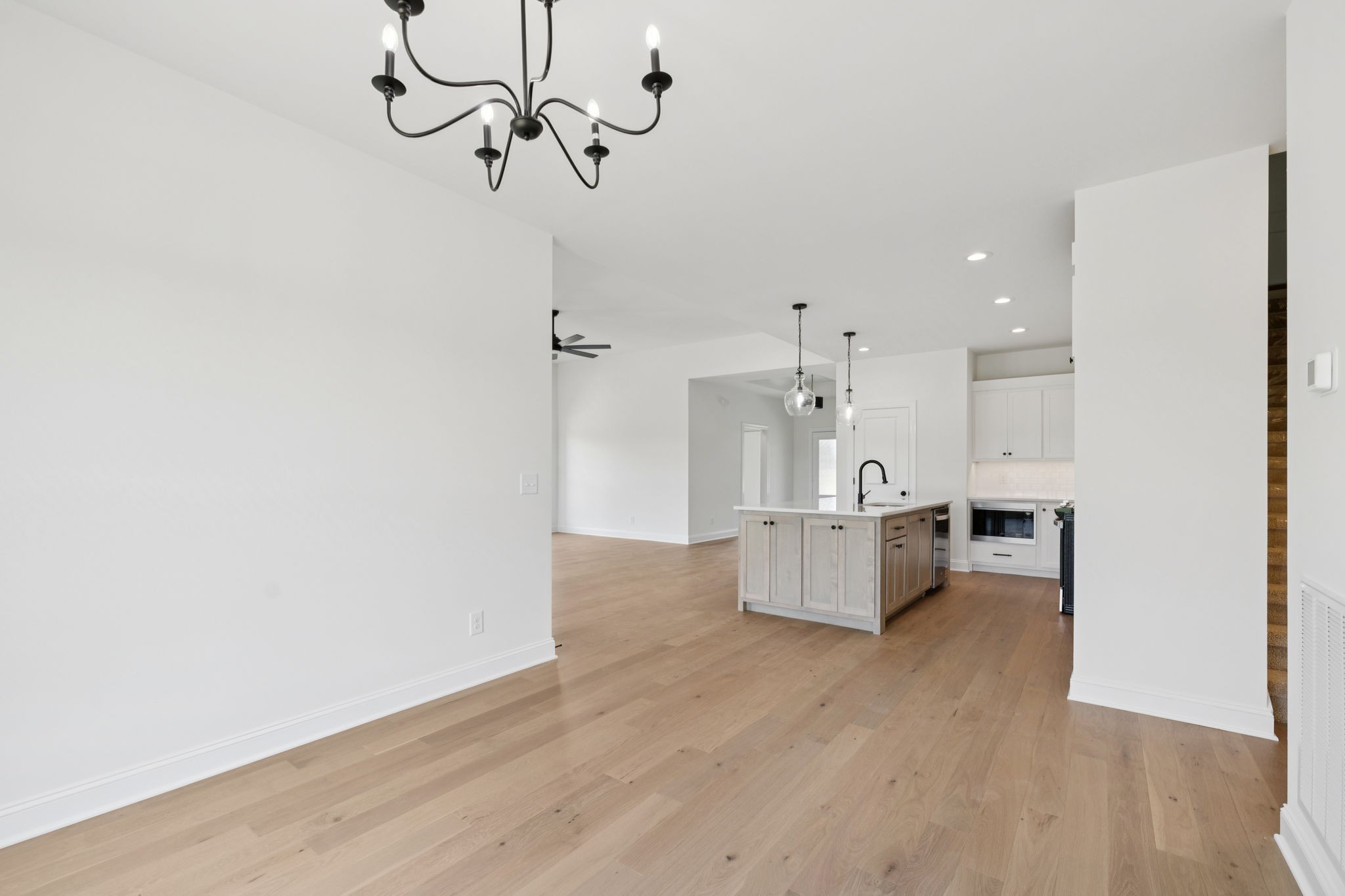 0 Midland Road Bell Buckle, TN 37020 - Photo 20 of 36 a living room with kitchen and a wooden floor