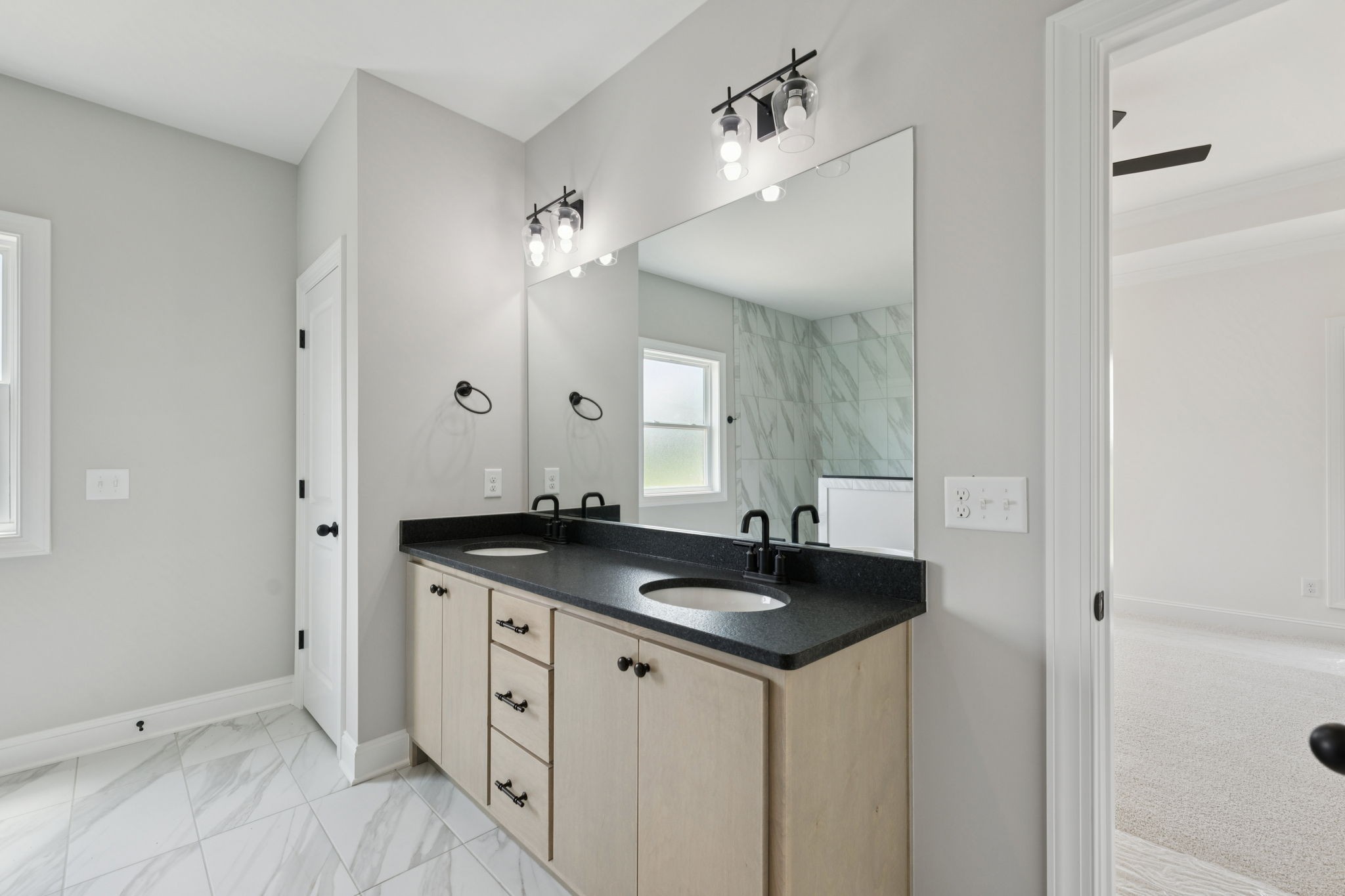 0 Midland Road Bell Buckle, TN 37020 - Photo 25 of 36 a bathroom with a granite countertop sink and a mirror