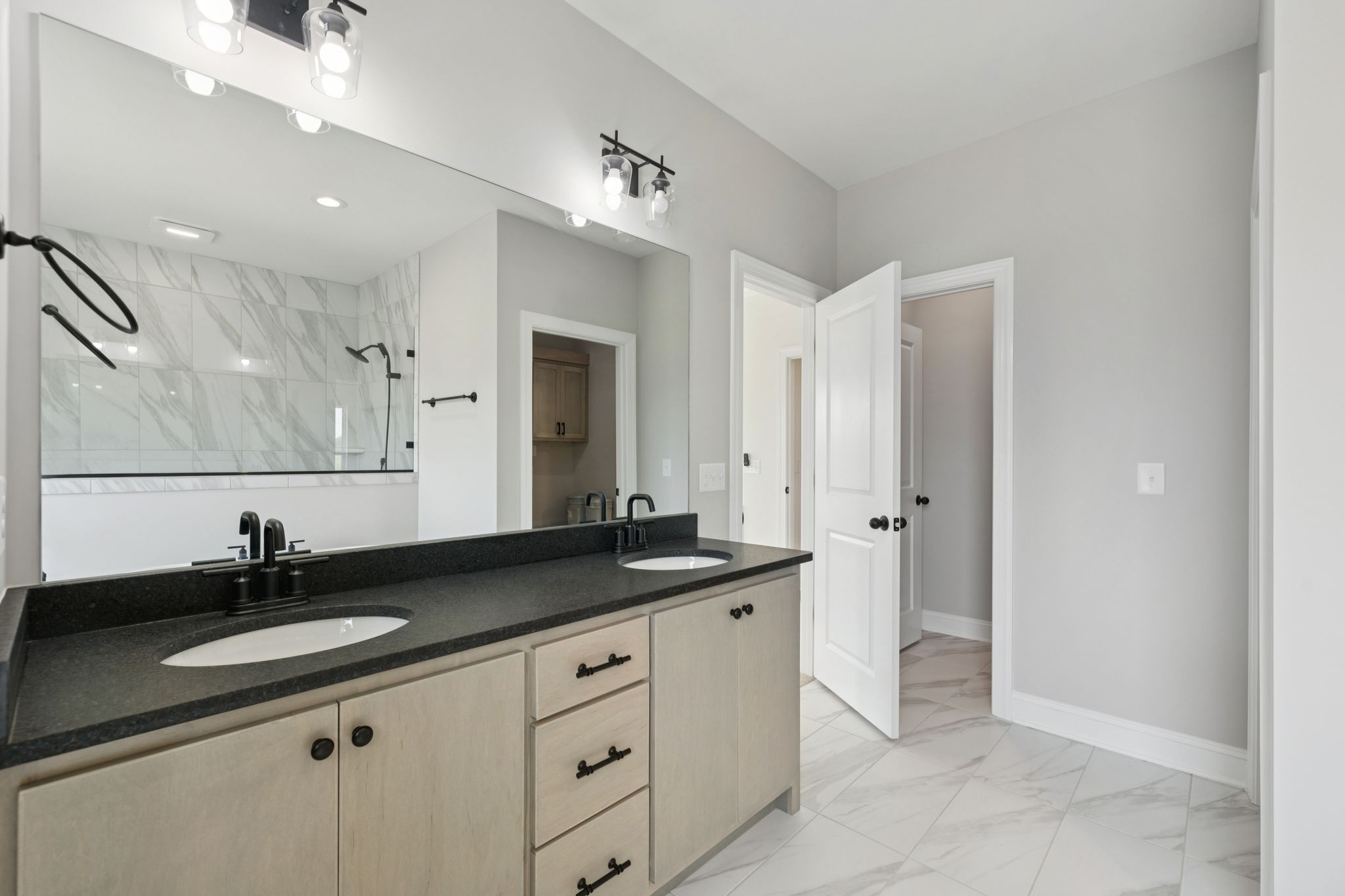 0 Midland Road Bell Buckle, TN 37020 - Photo 29 of 36 a bathroom with a granite countertop sink a large mirror and a refrigerator