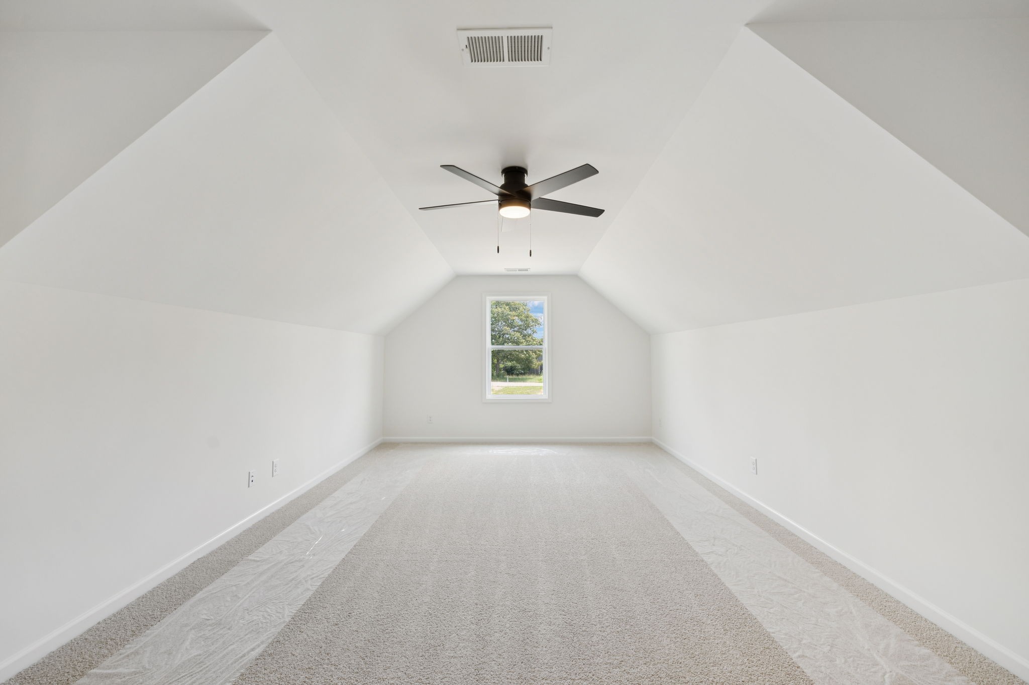 0 Midland Road Bell Buckle, TN 37020 - Photo 30 of 36 an empty room with a window and a ceiling fan