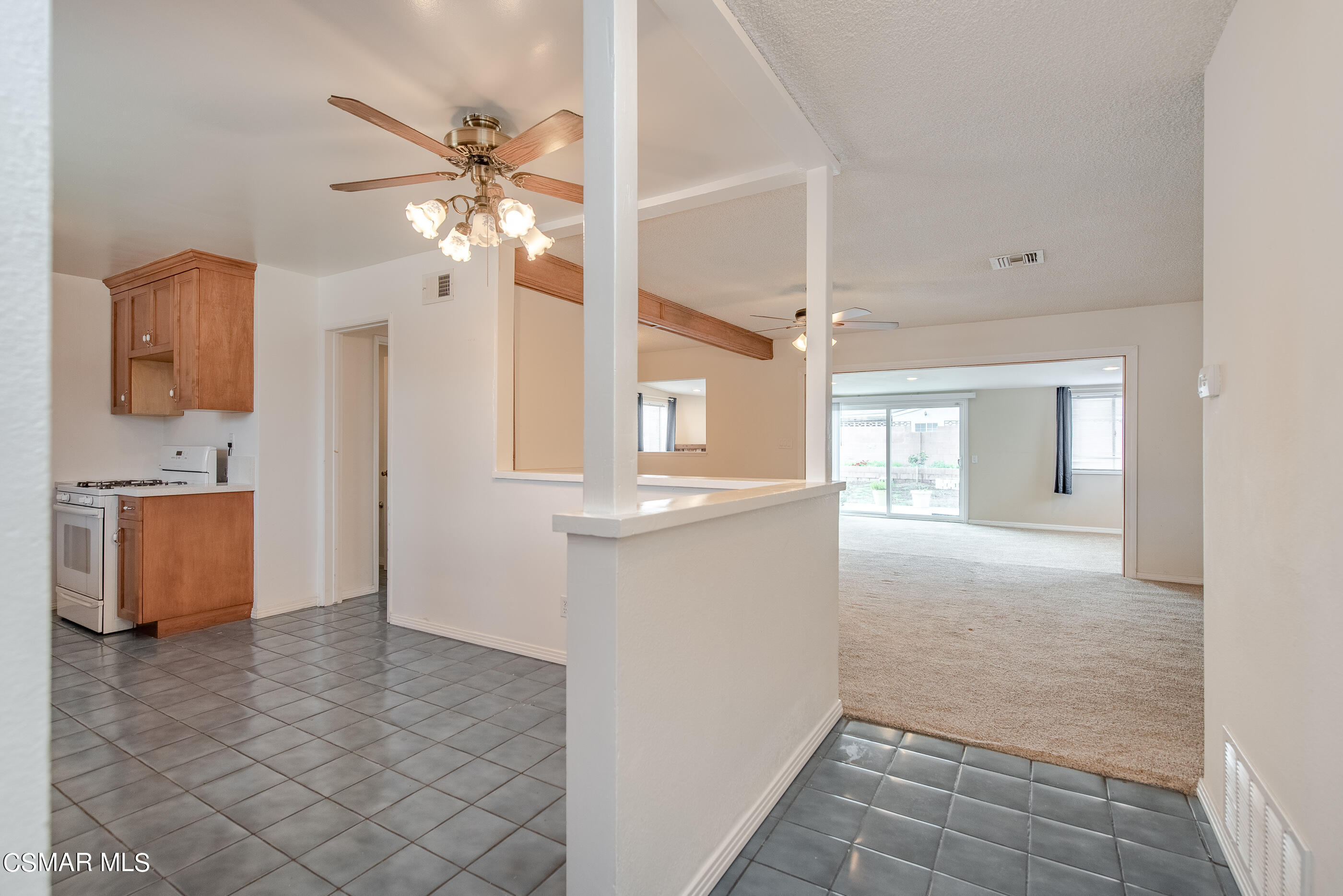 1858 Sutter Avenue Simi Valley, CA 93065 - Photo 12 of 24 a view of a kitchen with a sink and a chandelier