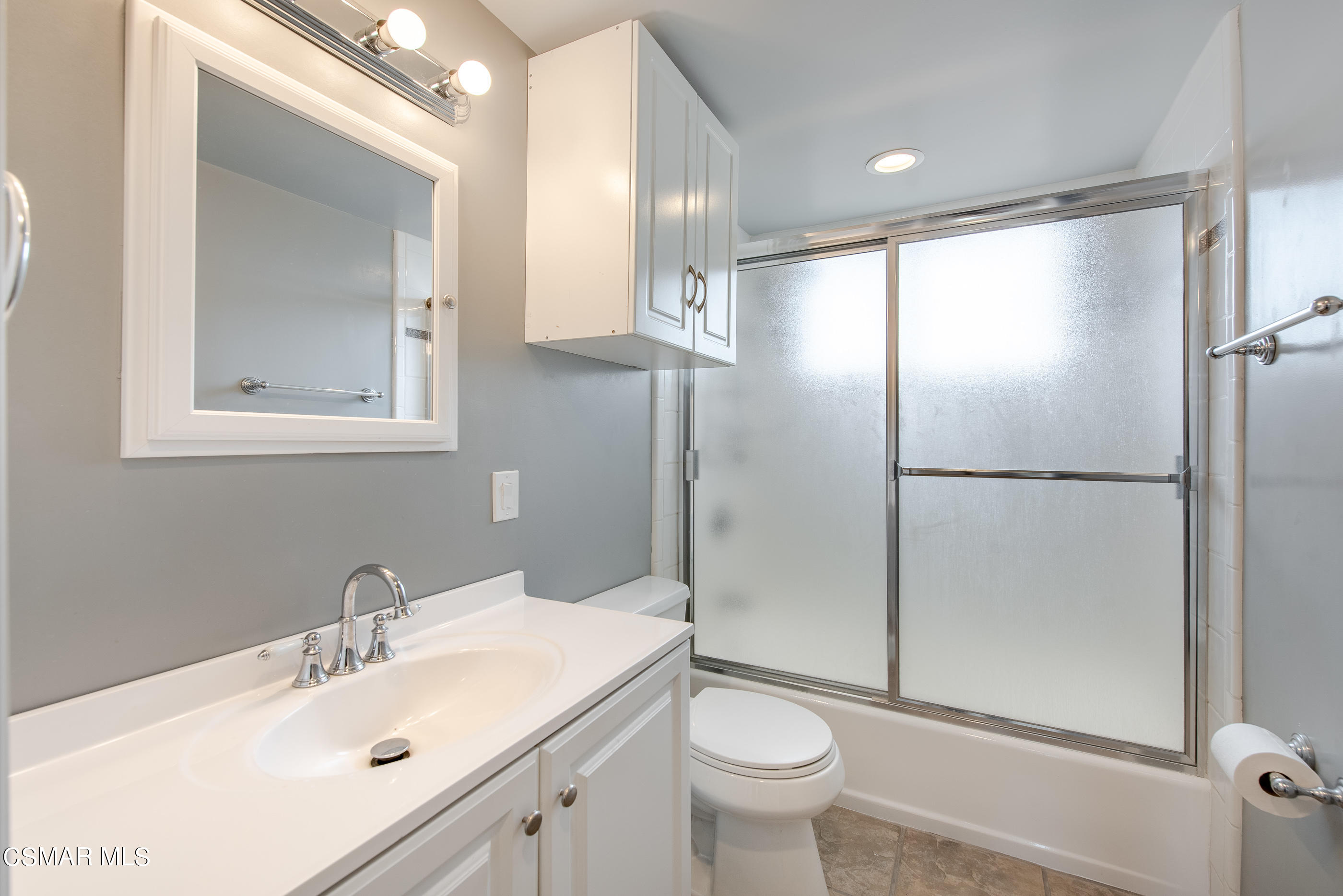 1858 Sutter Avenue Simi Valley, CA 93065 - Photo 16 of 24 a bathroom with a sink toilet and shower