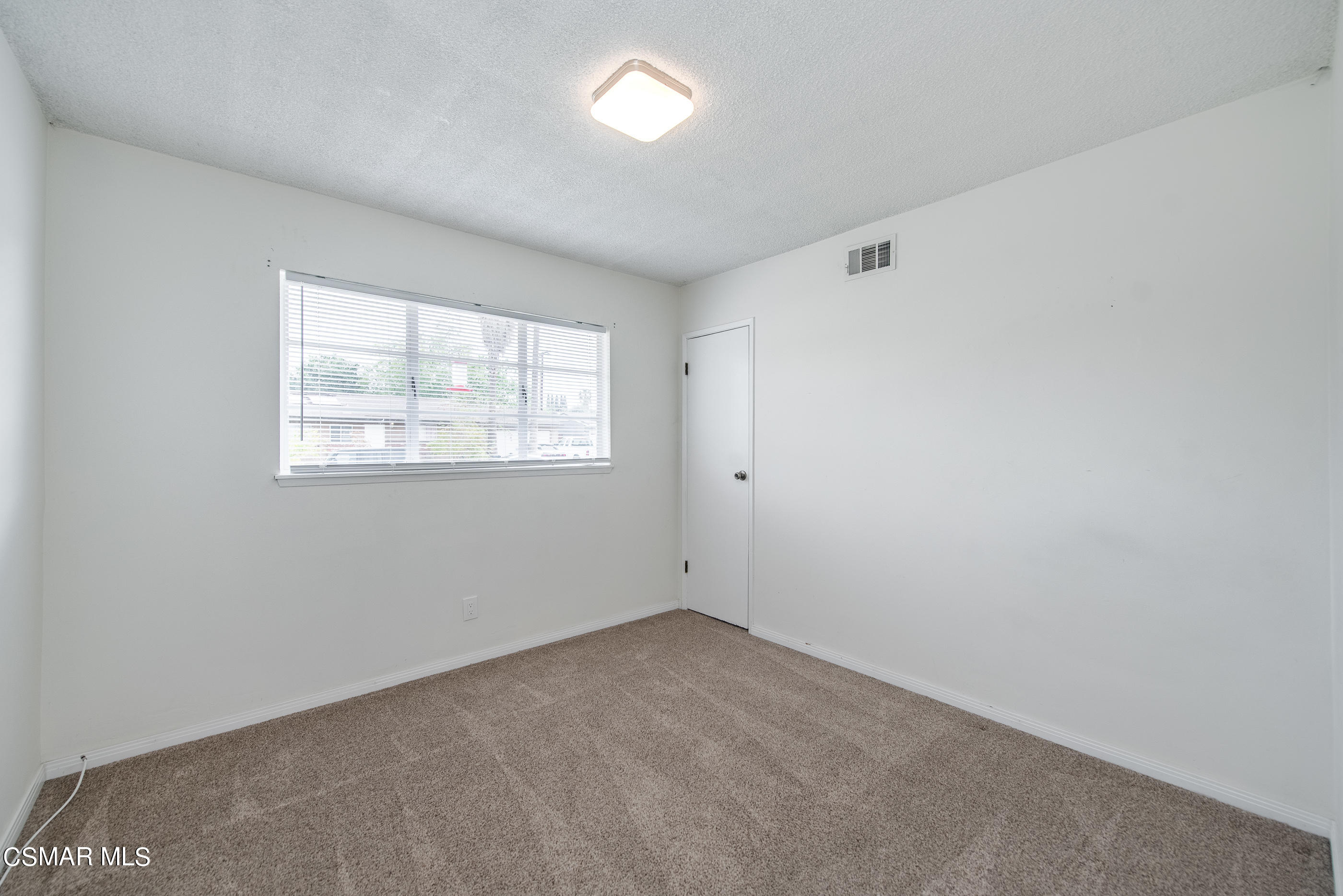 1858 Sutter Avenue Simi Valley, CA 93065 - Photo 17 of 24 an empty room with a window
