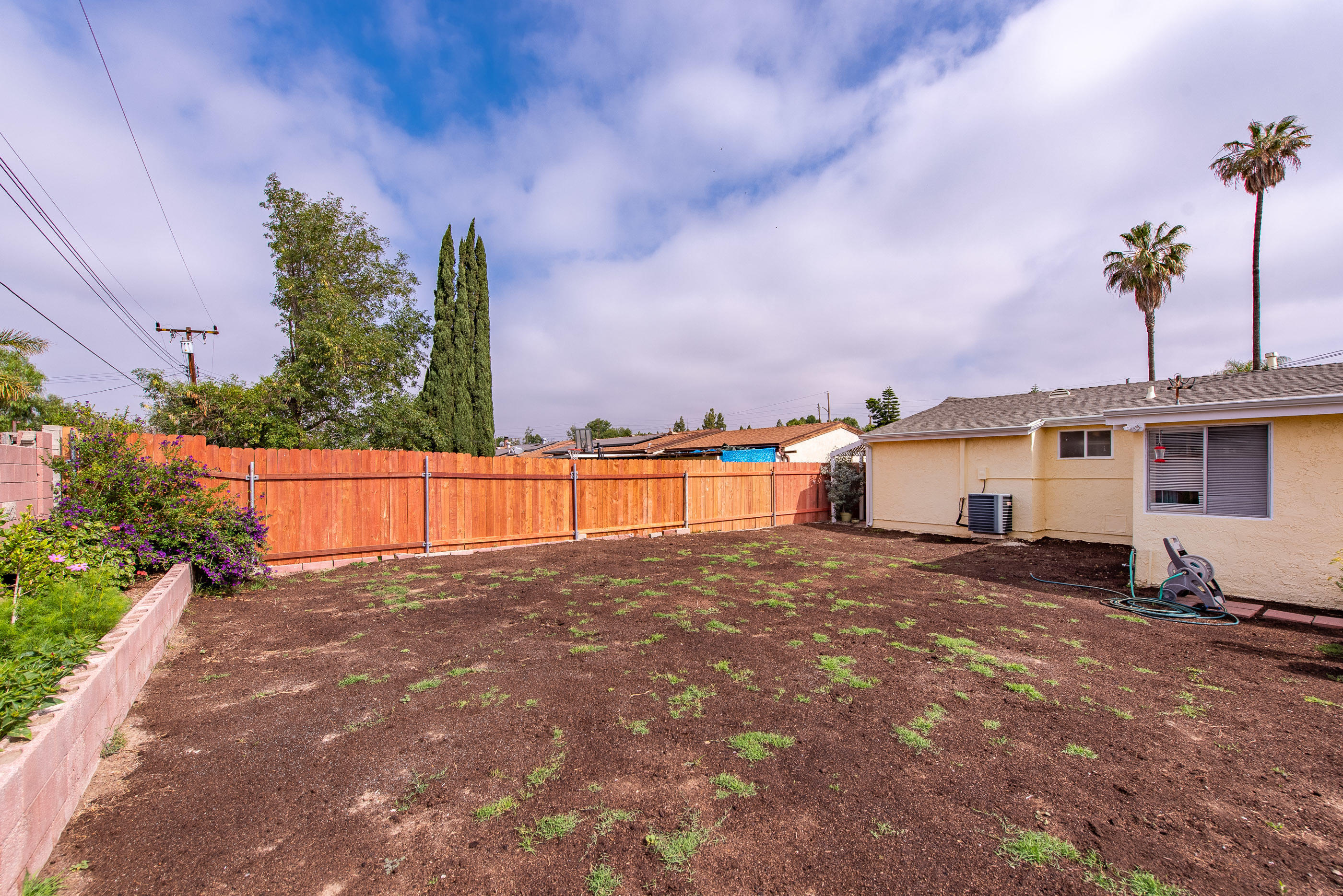 1858 Sutter Avenue Simi Valley, CA 93065 - Photo 21 of 24 a view of a house with a yard and potted plants