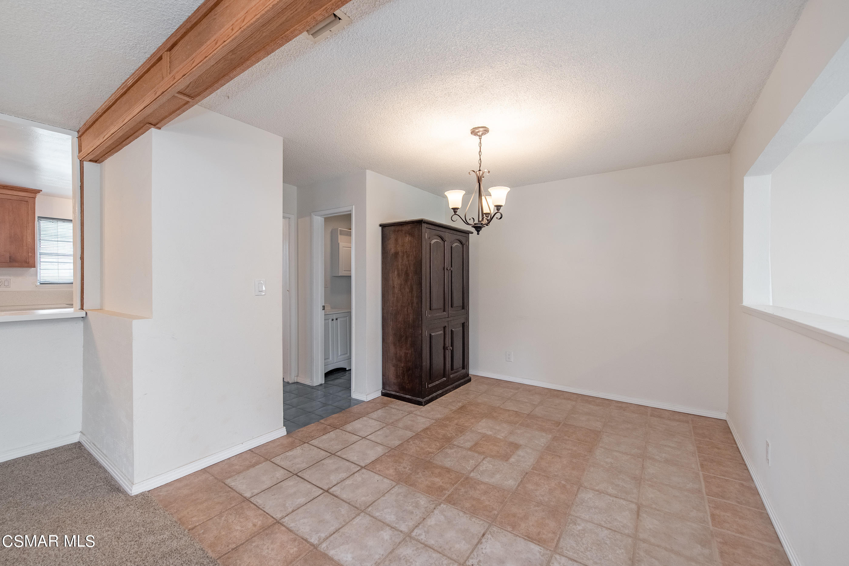 1858 Sutter Avenue Simi Valley, CA 93065 - Photo 9 of 24 a view of a room with a chandelier