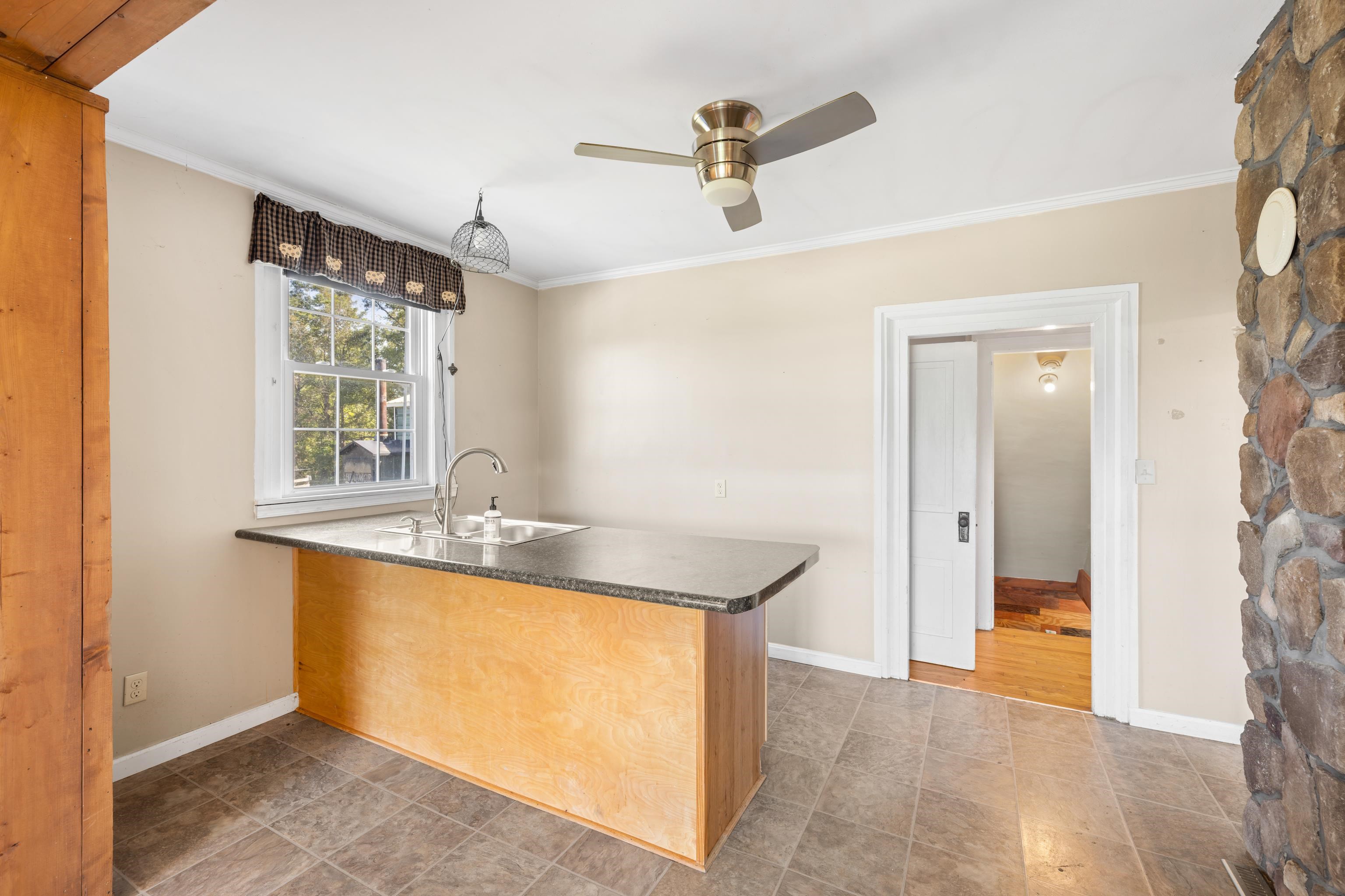 146 Mish Barn Road Middlebrook, VA 24459 - Photo 11 of 54 a bathroom with a sink and a mirror