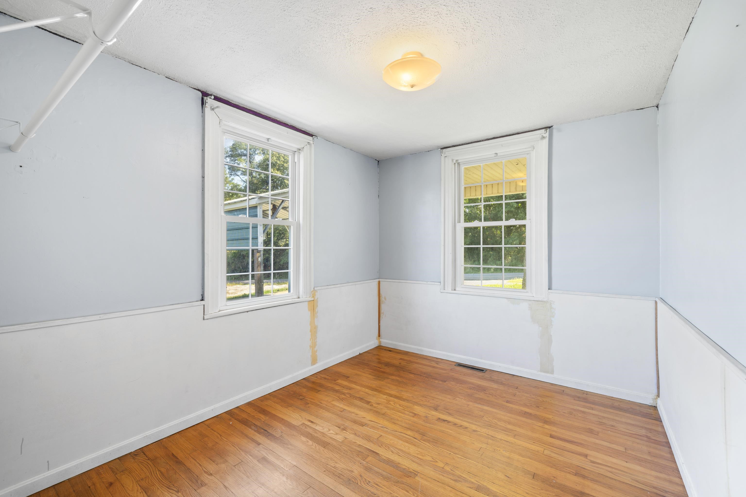 146 Mish Barn Road Middlebrook, VA 24459 - Photo 22 of 54 an empty room with windows