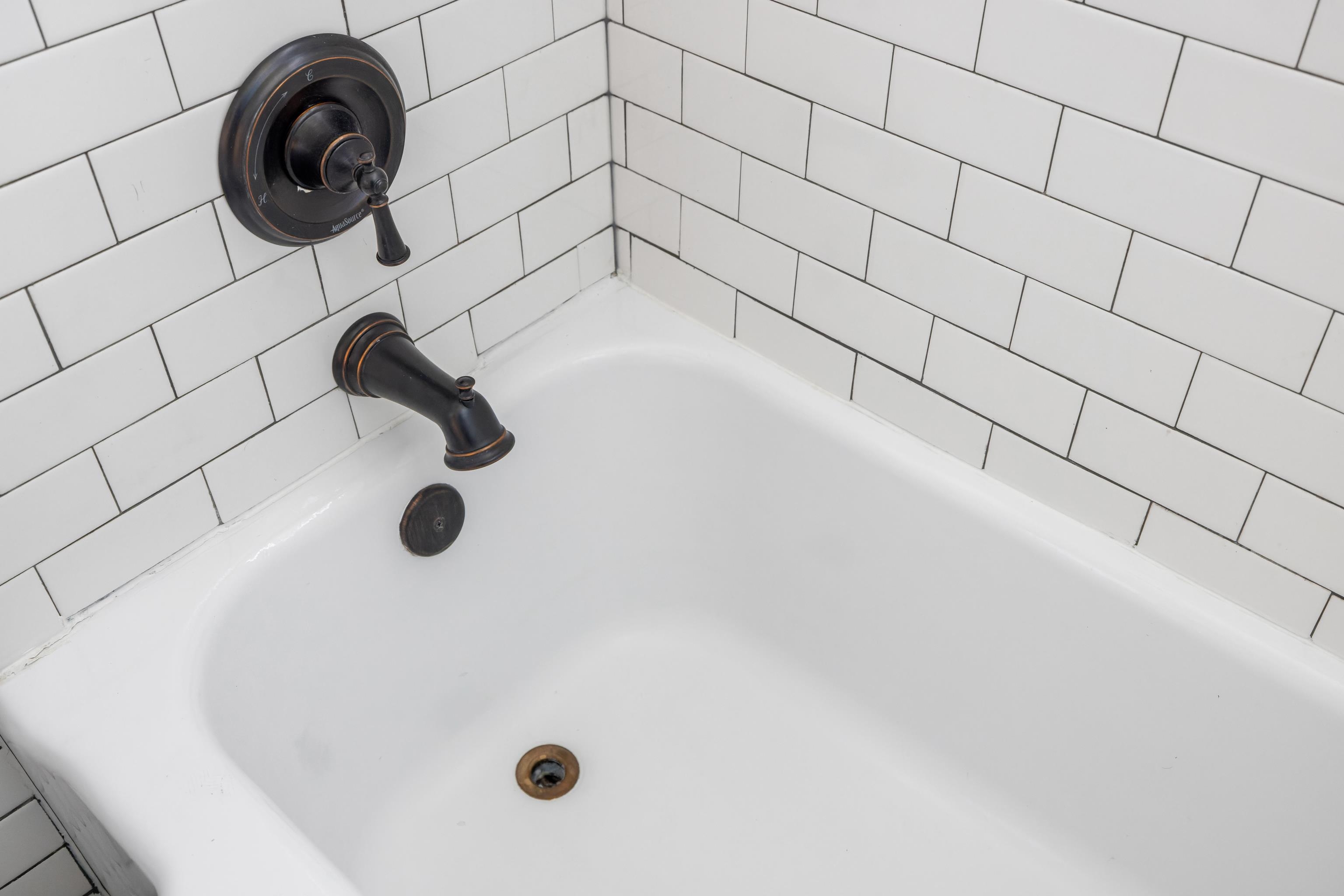 146 Mish Barn Road Middlebrook, VA 24459 - Photo 26 of 54 a bathroom with a bathtub