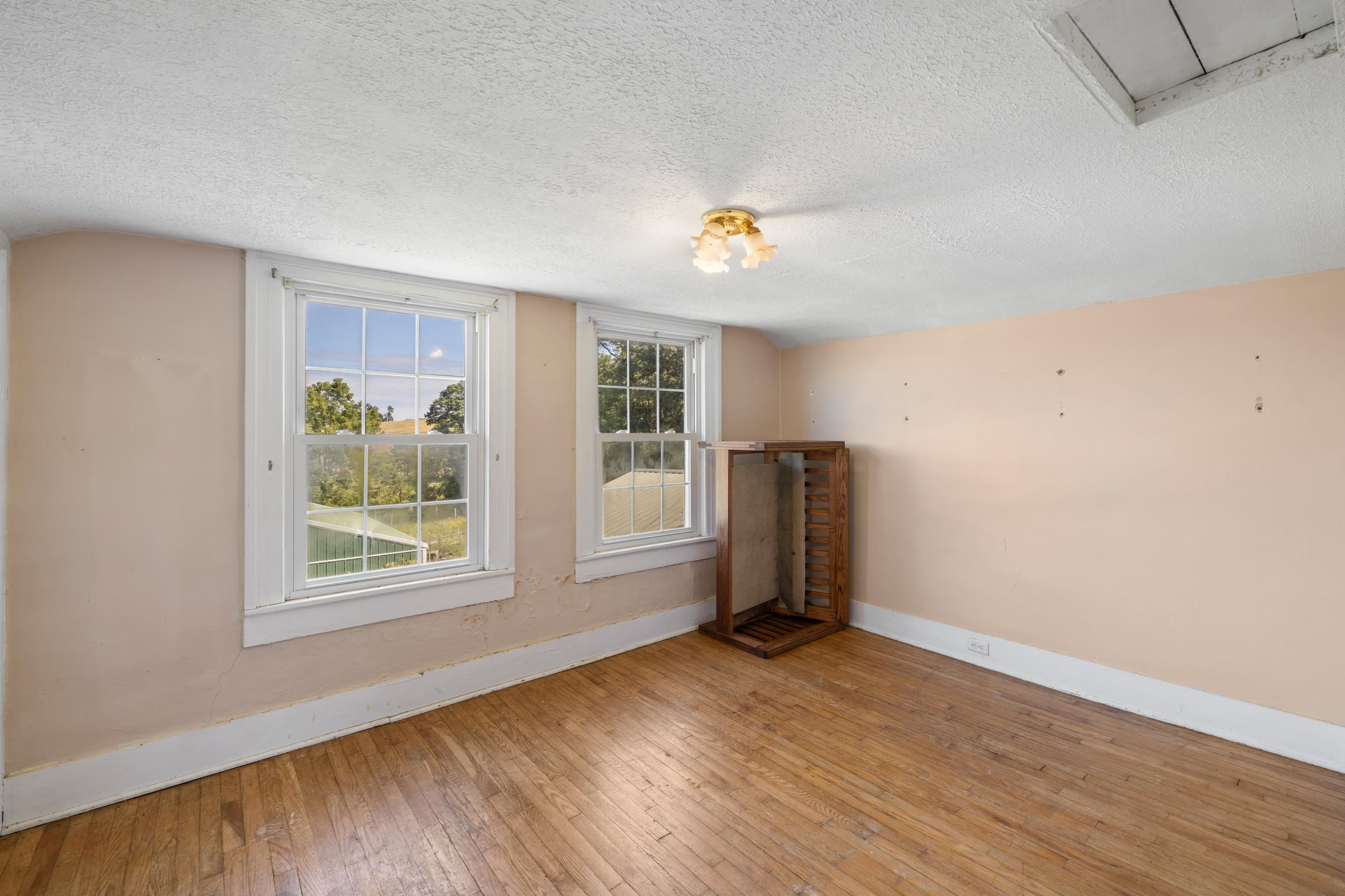 146 Mish Barn Road Middlebrook, VA 24459 - Photo 30 of 54 an empty room with windows and view