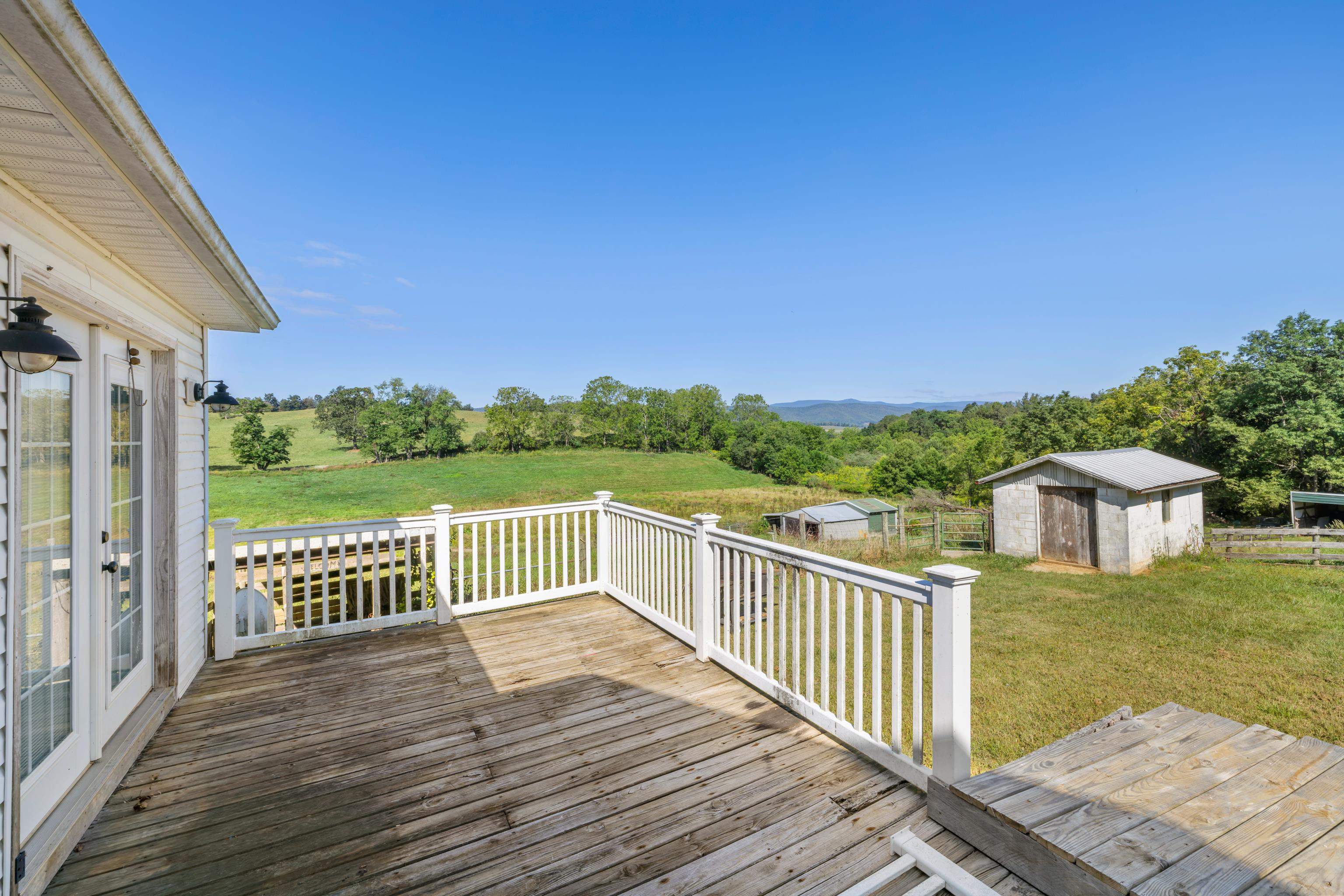 146 Mish Barn Road Middlebrook, VA 24459 - Photo 33 of 54 a view of a roof deck with wooden floor and fence