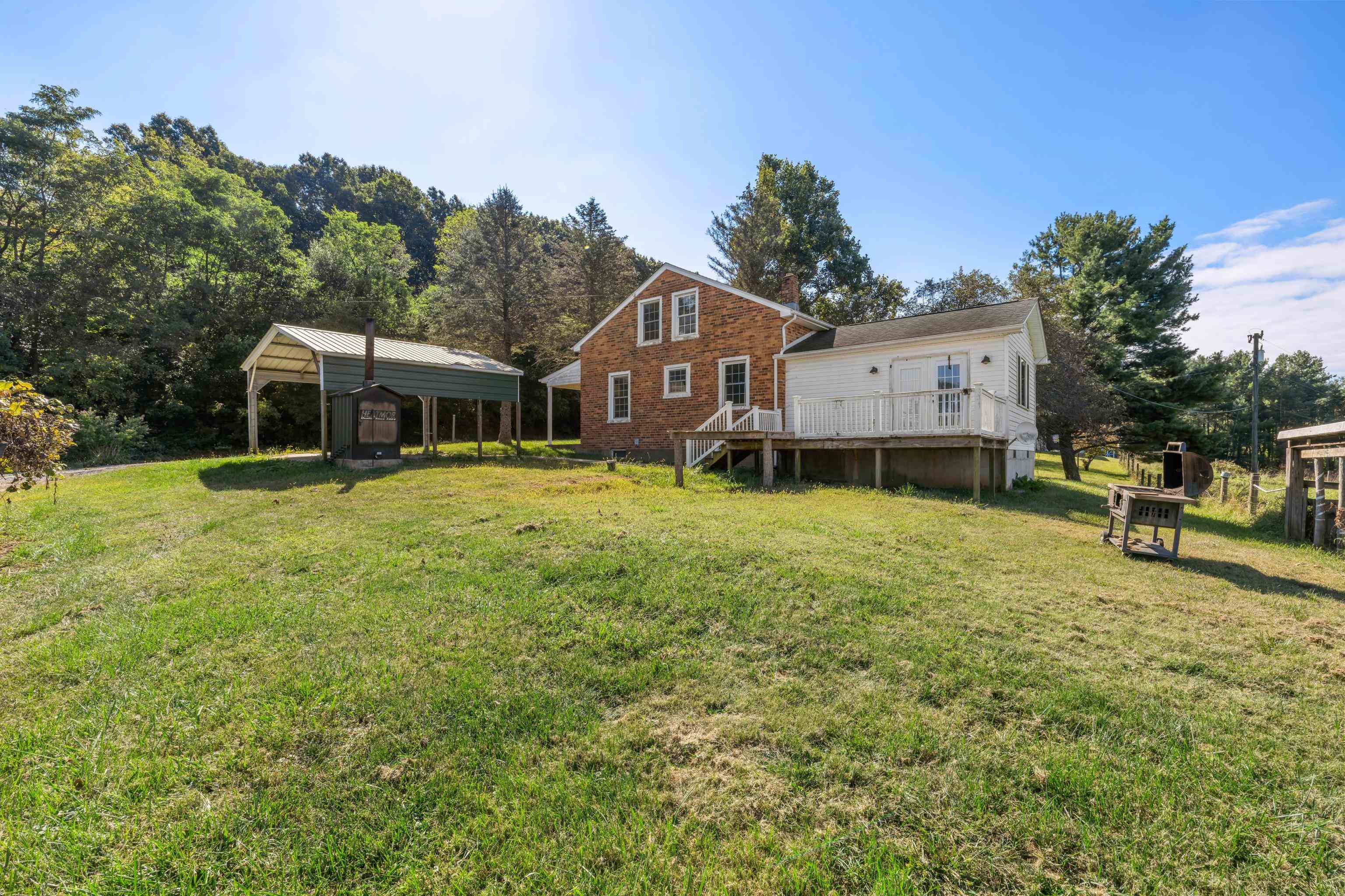146 Mish Barn Road Middlebrook, VA 24459 - Photo 37 of 54 a house view with a sitting space and garden