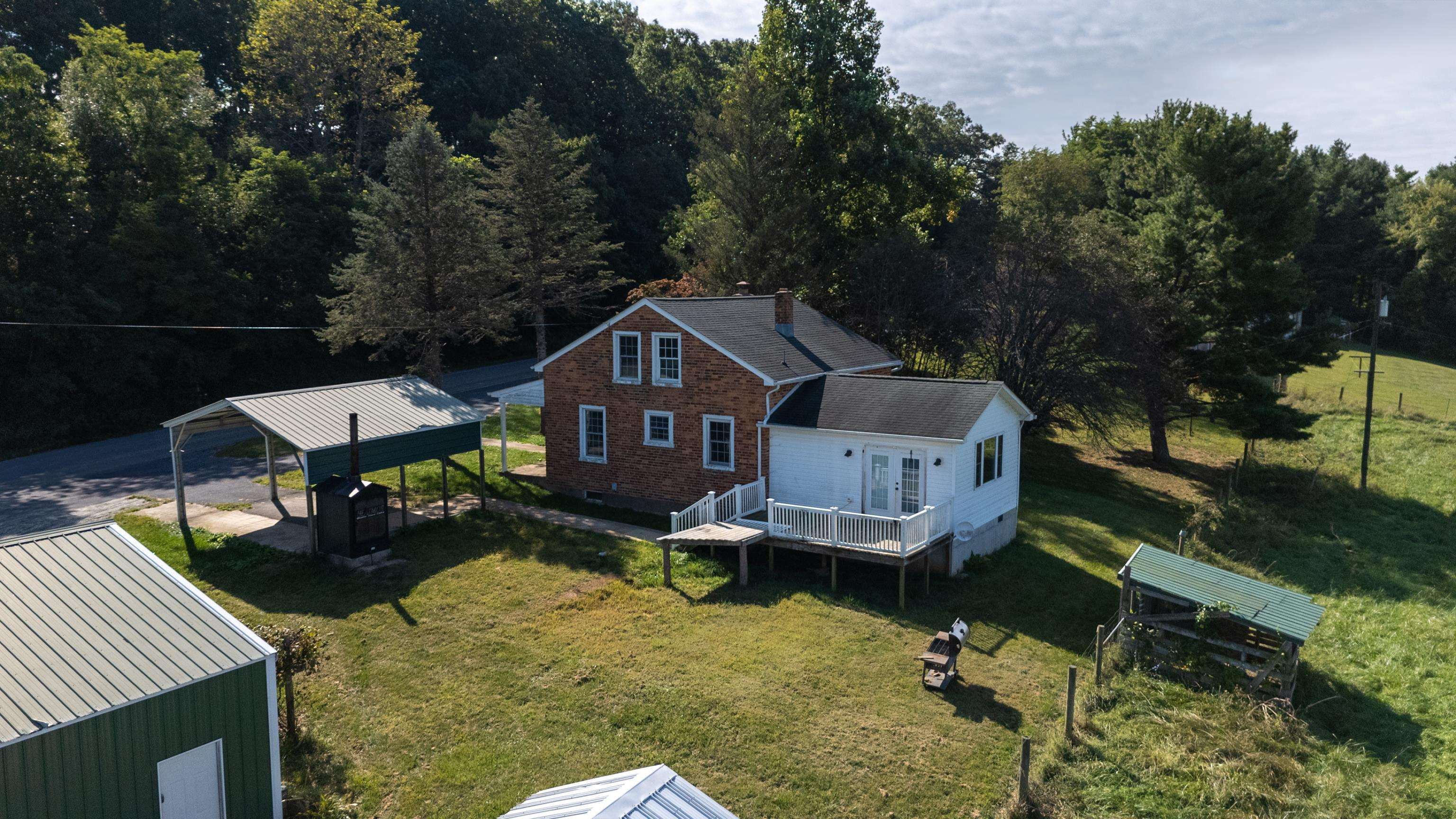 146 Mish Barn Road Middlebrook, VA 24459 - Photo 43 of 54 an aerial view of a house with a yard
